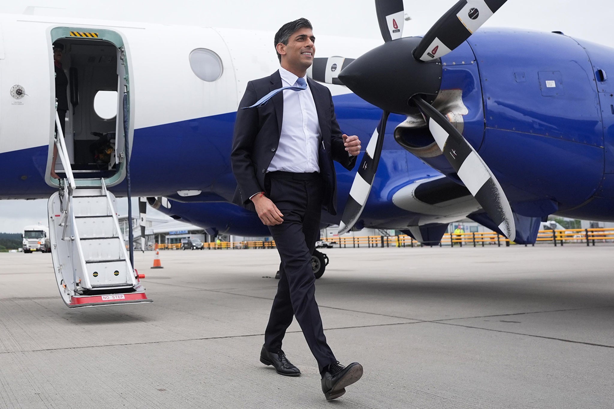 Rishi Sunak arrives for a campaign event at Inverness airport