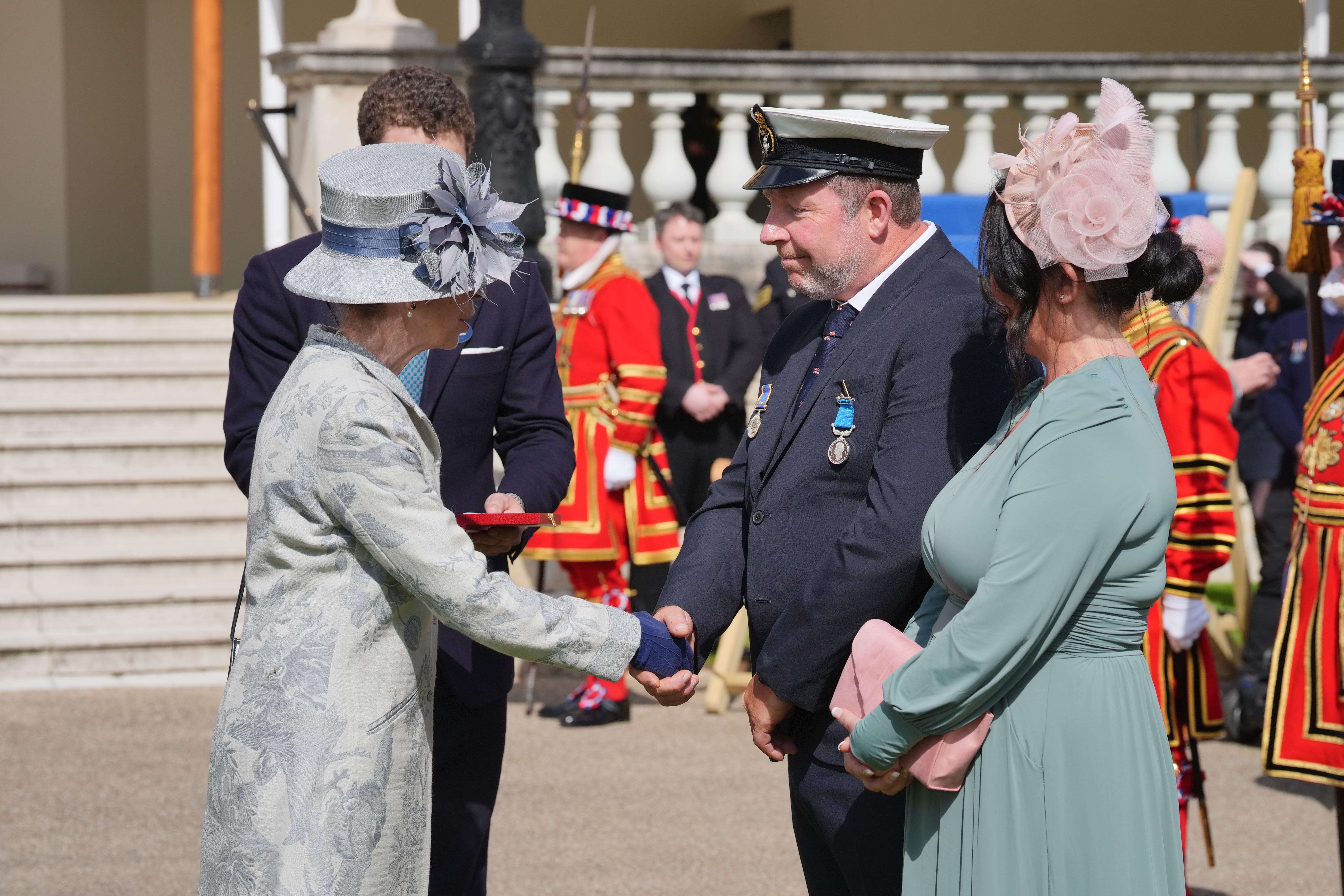 The Princess Royal after pinning a Silver Medal for Gallantry on Patch Harvey (Jonathan Brady/PA)