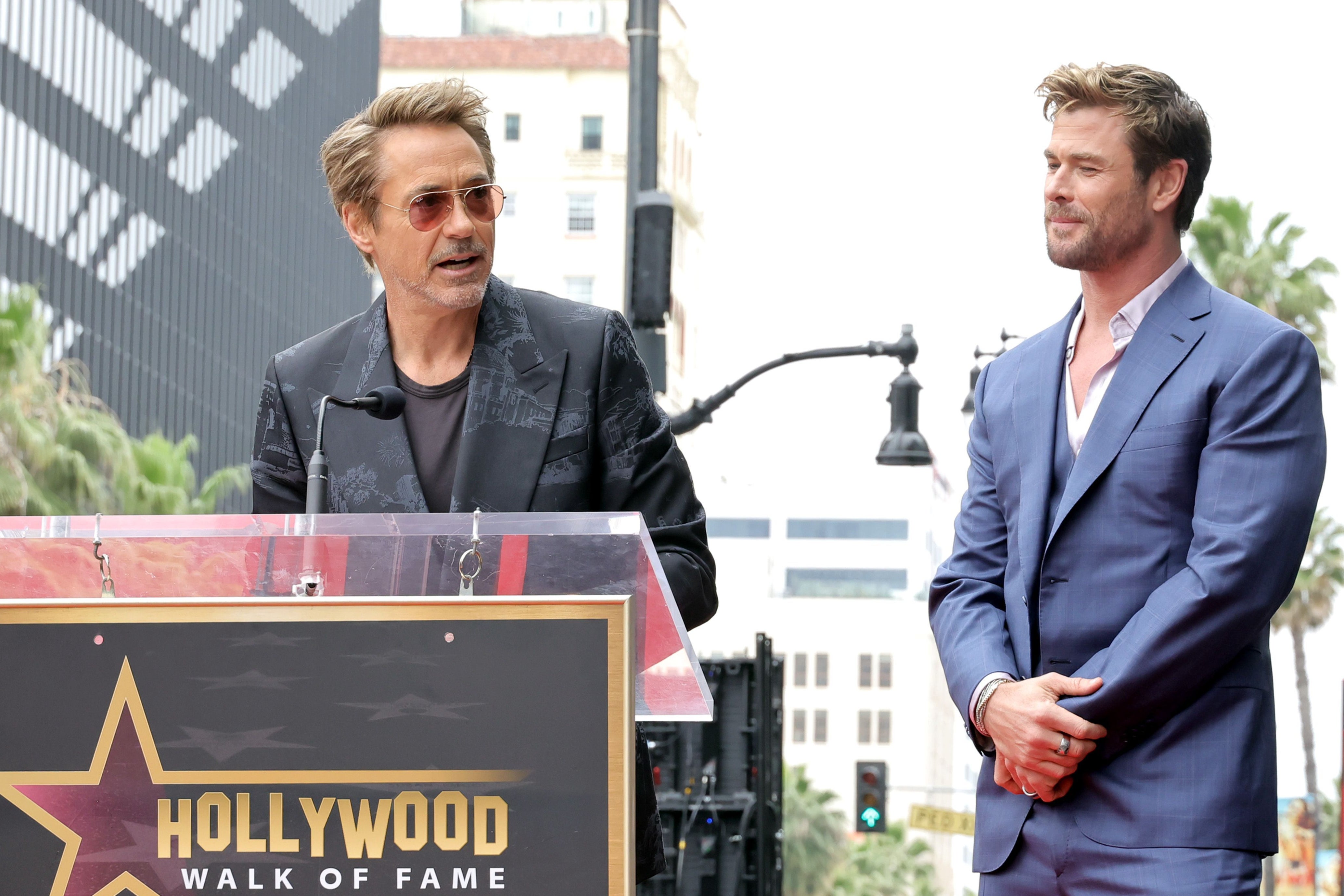 Robert Downey Jr and Chris Hemsworth during Hemsworth’s Hollywood Walk of Fame Star Ceremony on 23 May 2024