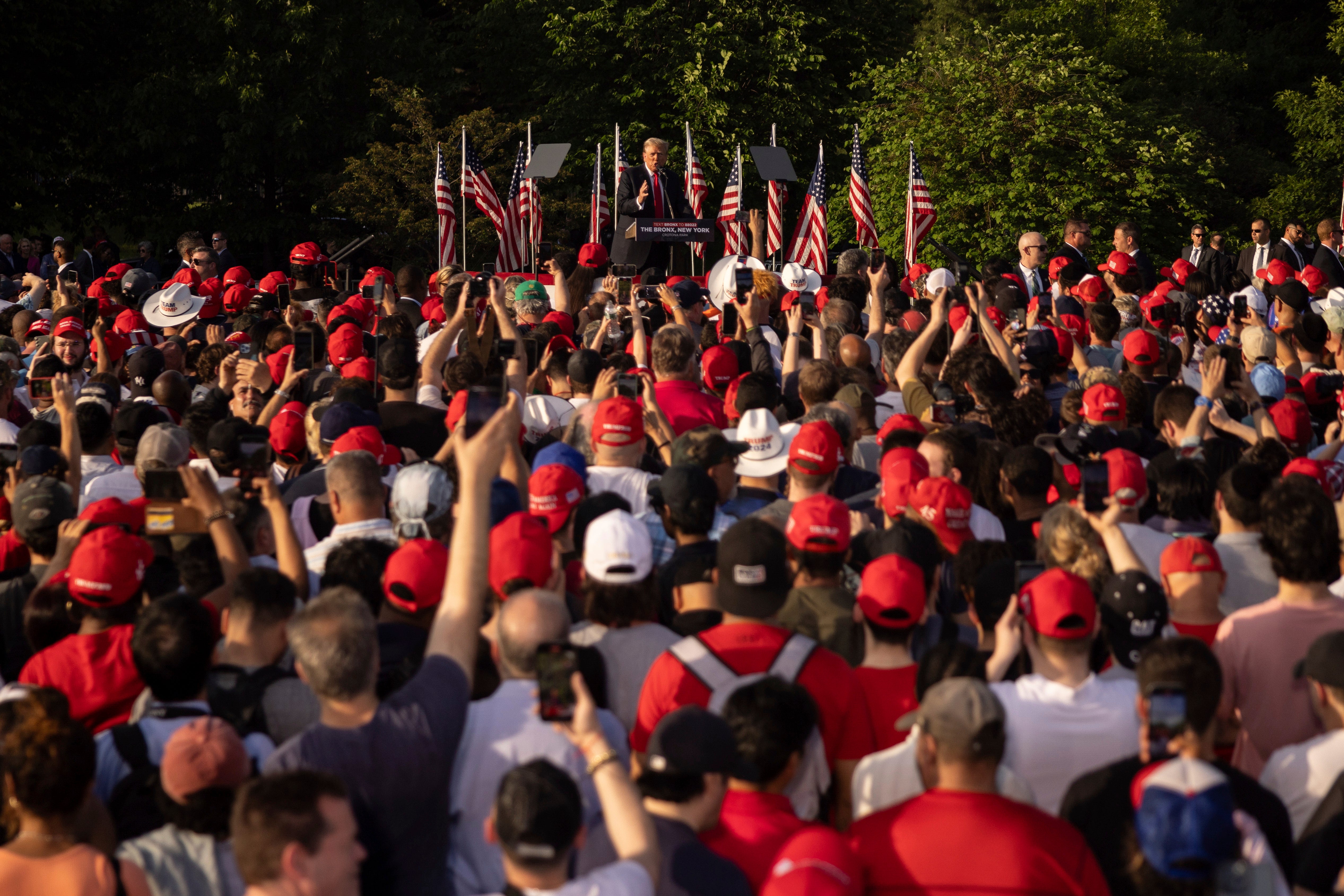 A sea of Maga supporters sport their red caps at Donald Trumps New York rally on Thursday