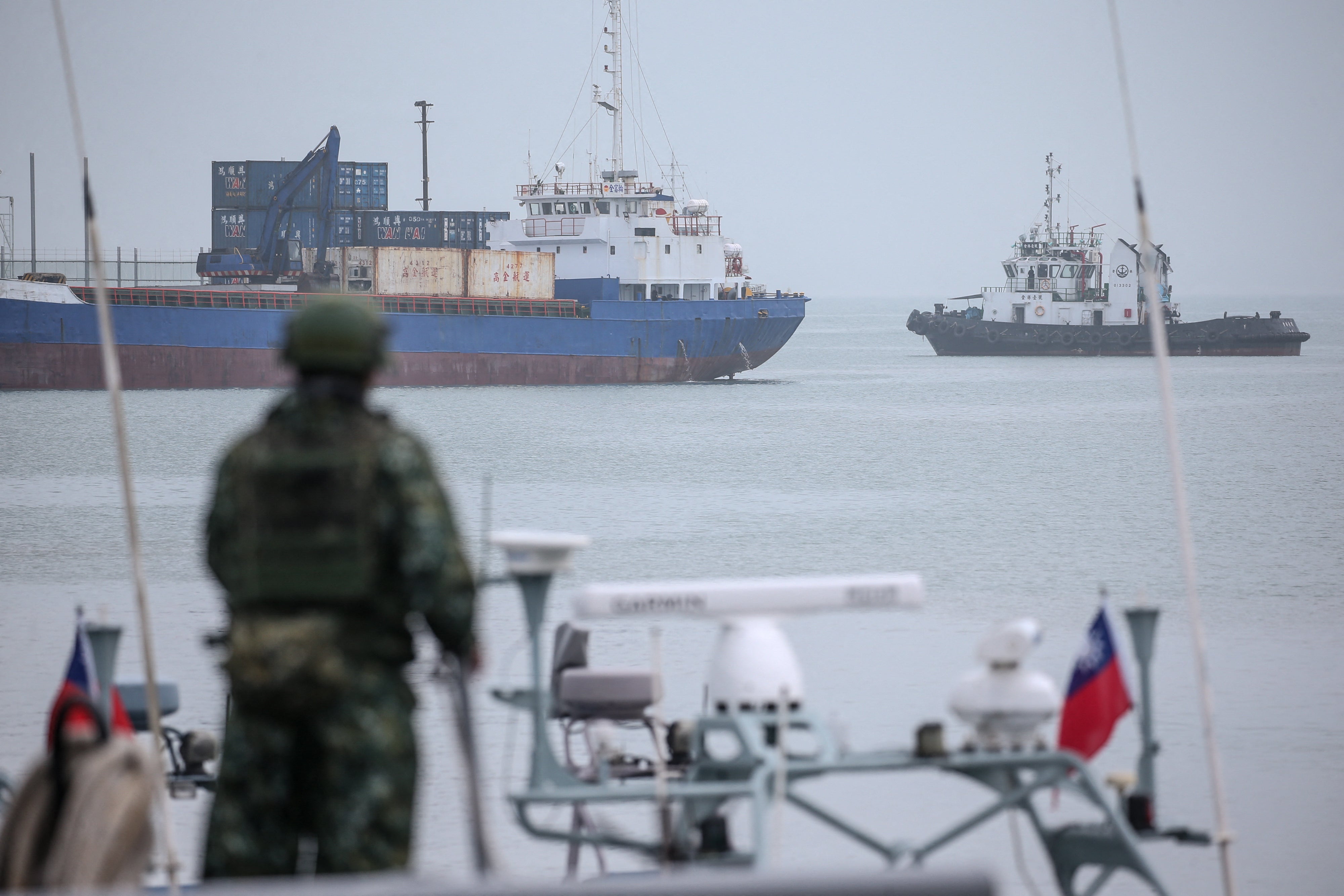 A member of Taiwan’s military (front) takes part in routine exercises at Liaoluo Port in Kinmen
