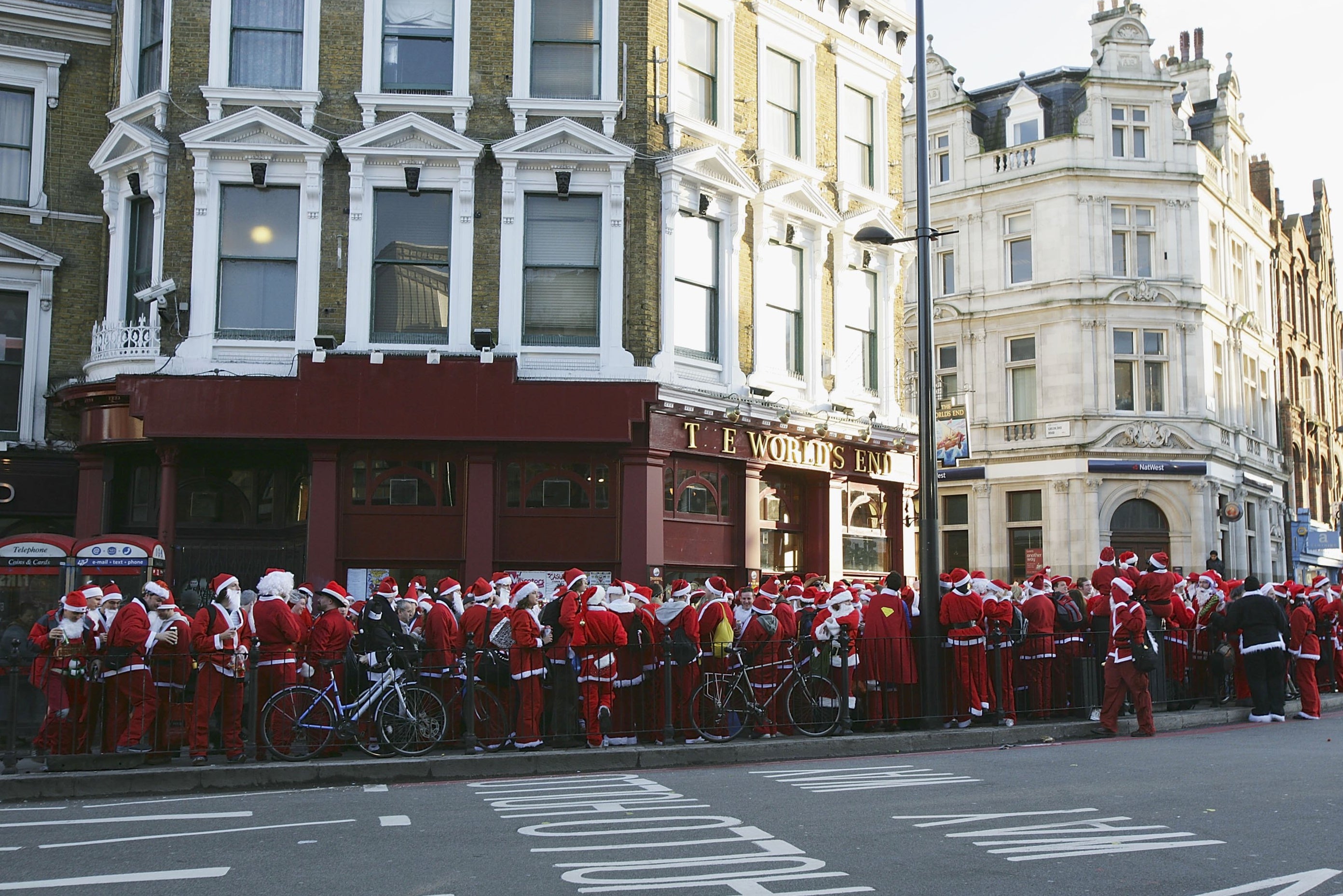 A flash mob of revellers dressed as Father Christmas are photographed in London’s Camden Town in 2006