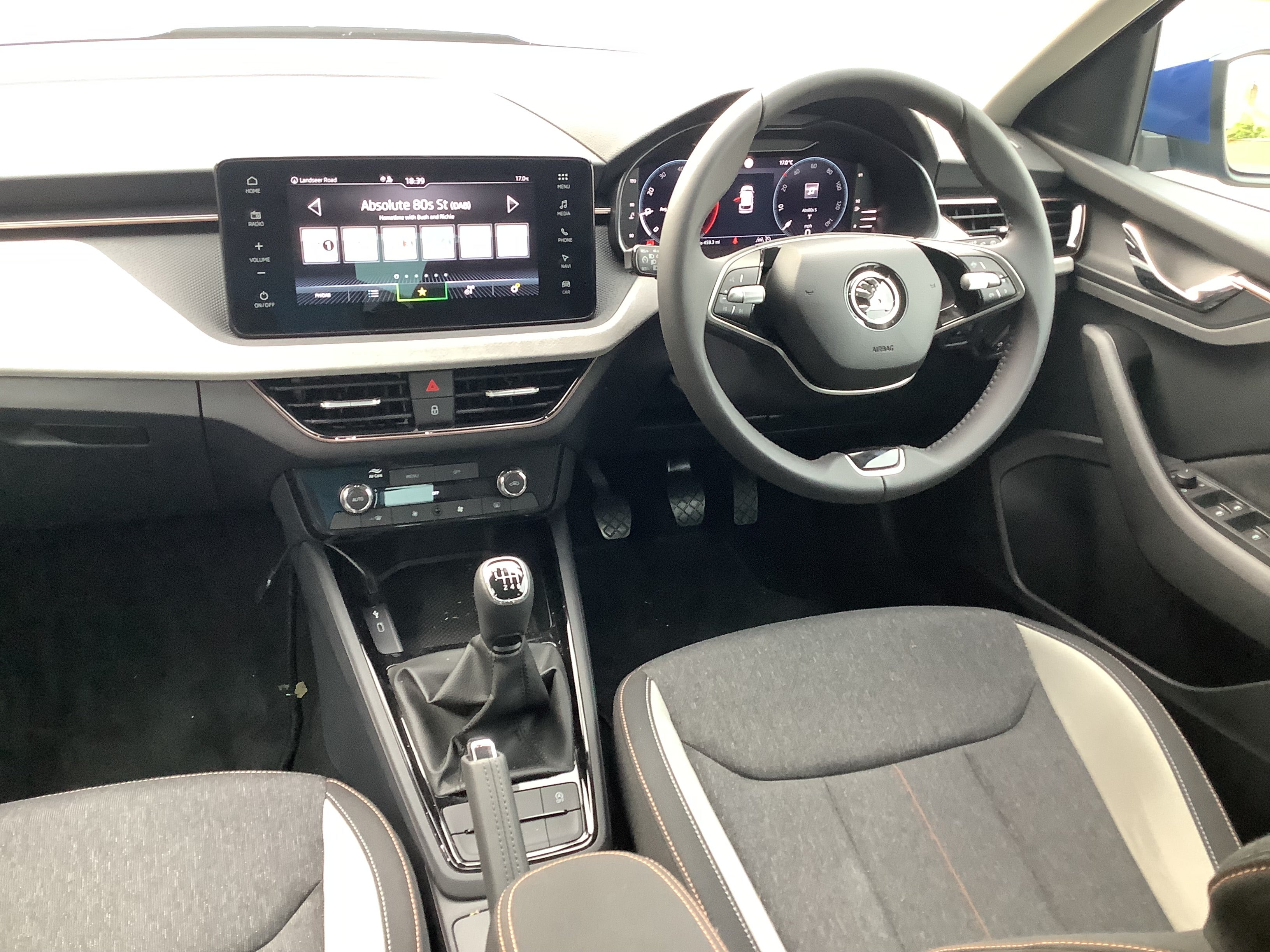 The two-spoke multifunction steering wheel and 8.25-inch touchscreen