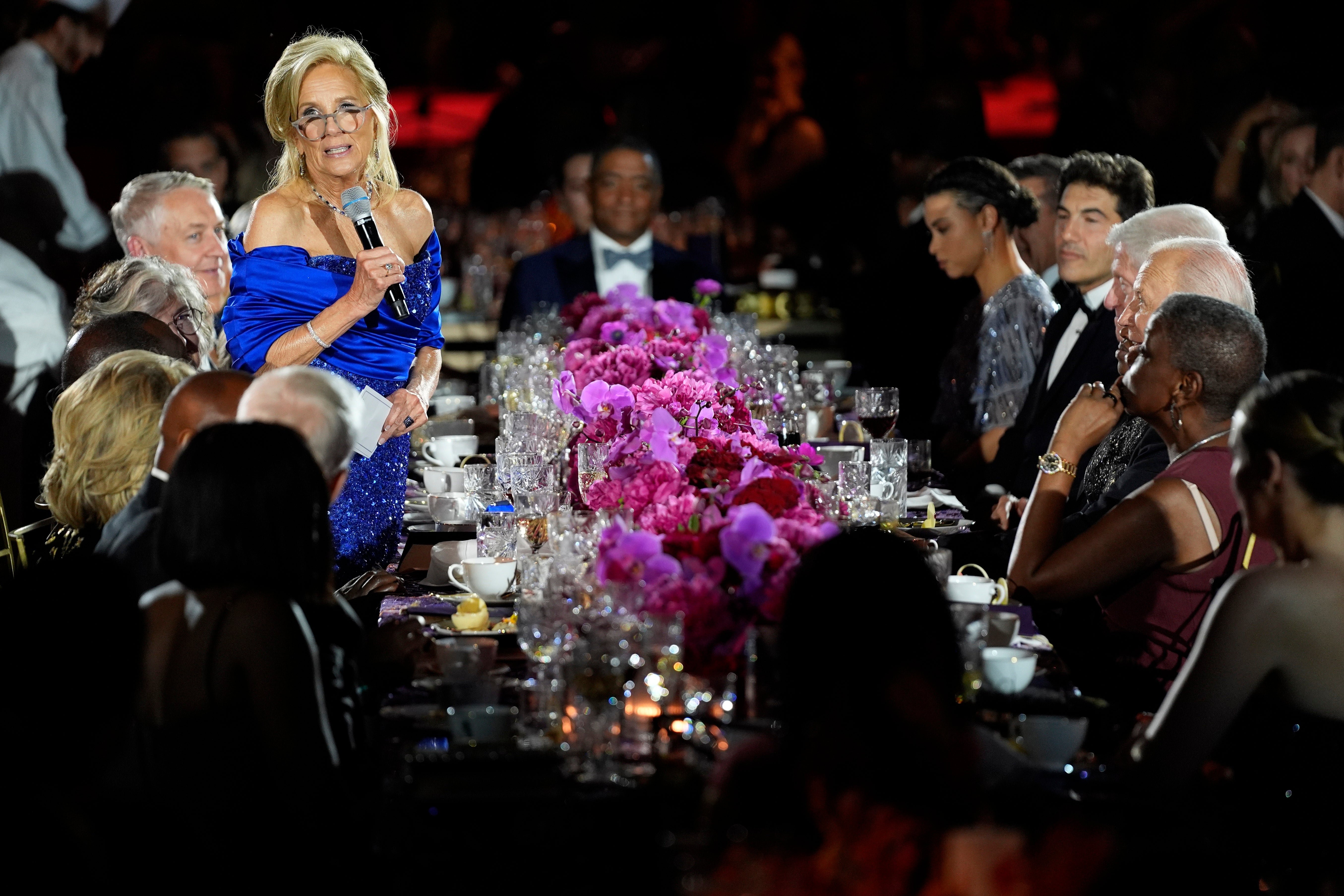 First Lady Jill Biden speaks before county music performer Brad Paisley sings during the State Dinner