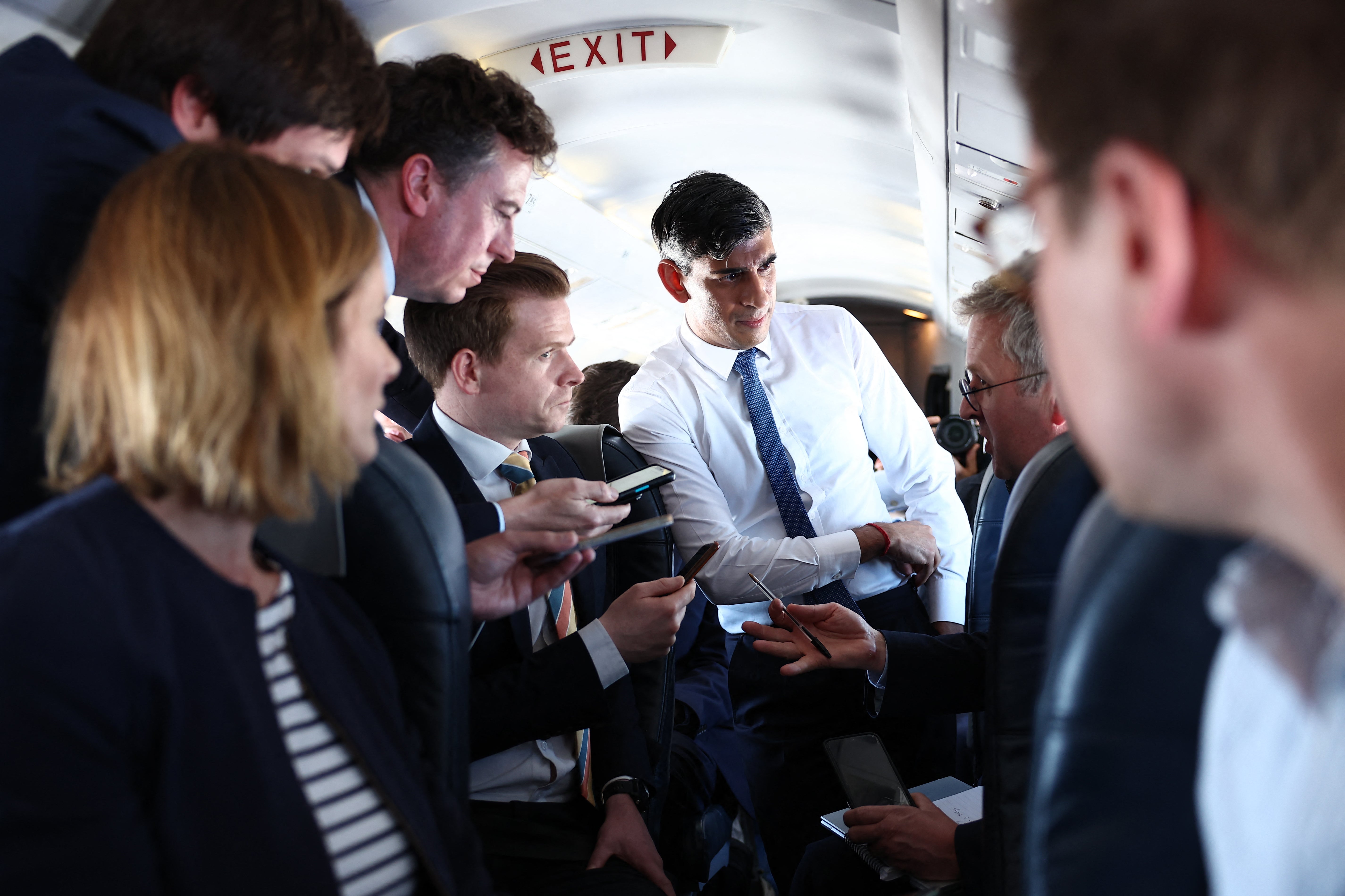 Rishi Sunak speaks to journalists on the plane on their way to Staffordshire