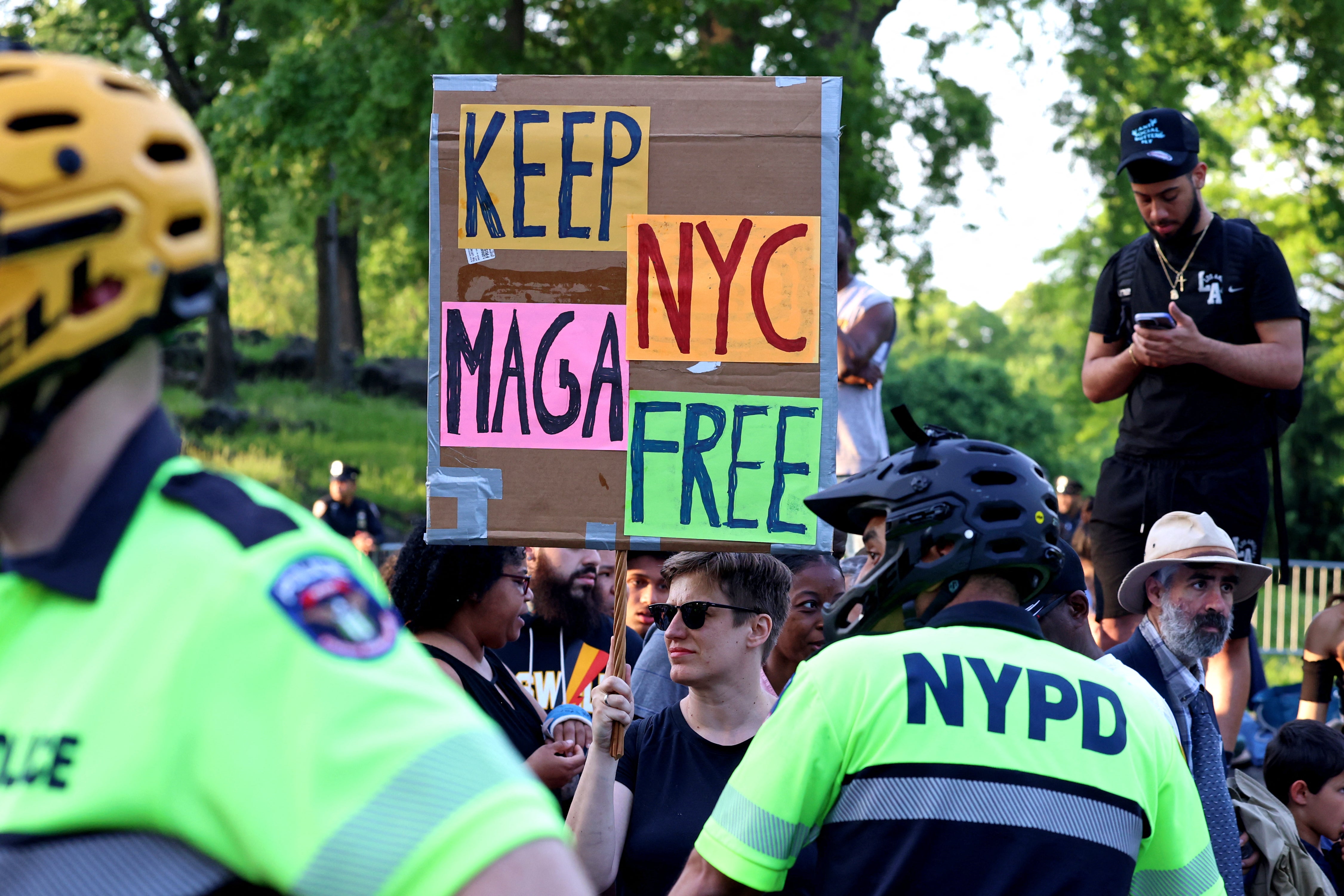 Protestors confront supporters of US President and Republican presidential candidate Donald Trump during campaign rally in the South Bronx in New York City on May 23, 2024