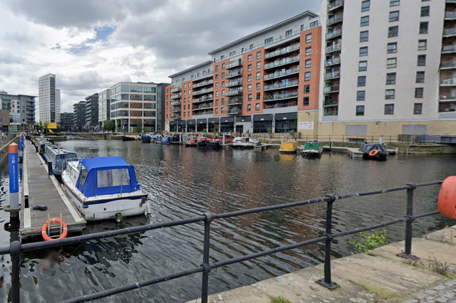 <p>Emergency services were called after a woman entered the water near Clarence Dock </p>