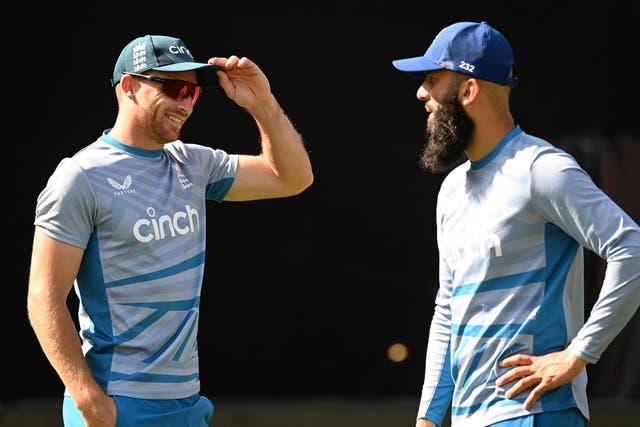<p>Jos Buttler (left) may surrender the captaincy to Moeen Ali (right) if his wife goes into labour </p>