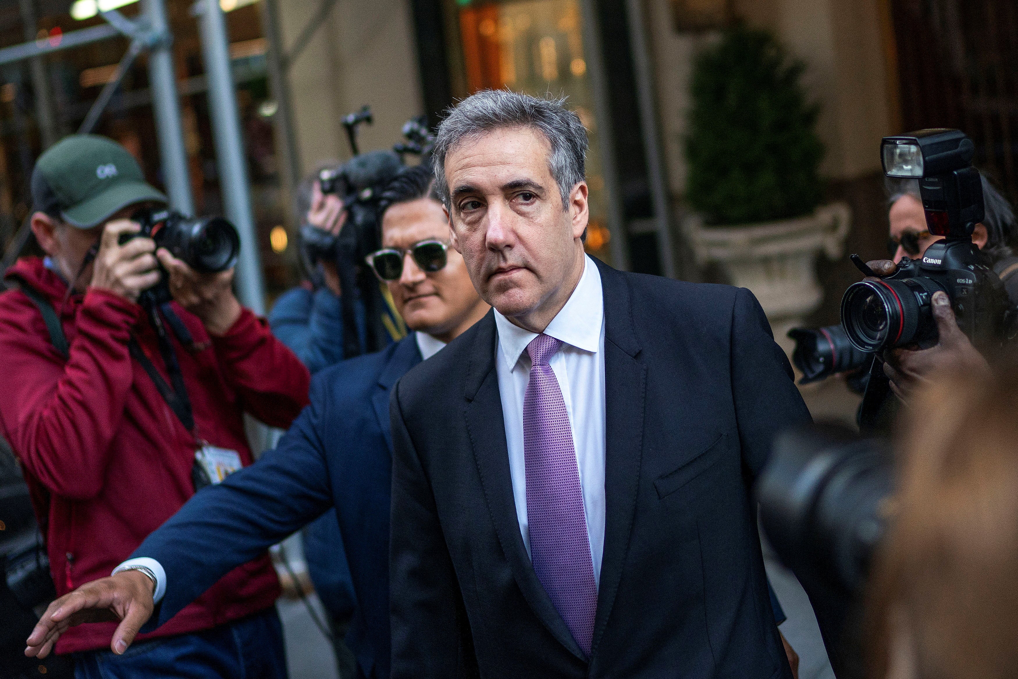 Michael Cohen leaves his apartment building in Manhattan to testify in Donald Trump’s hush money trial on May 20.