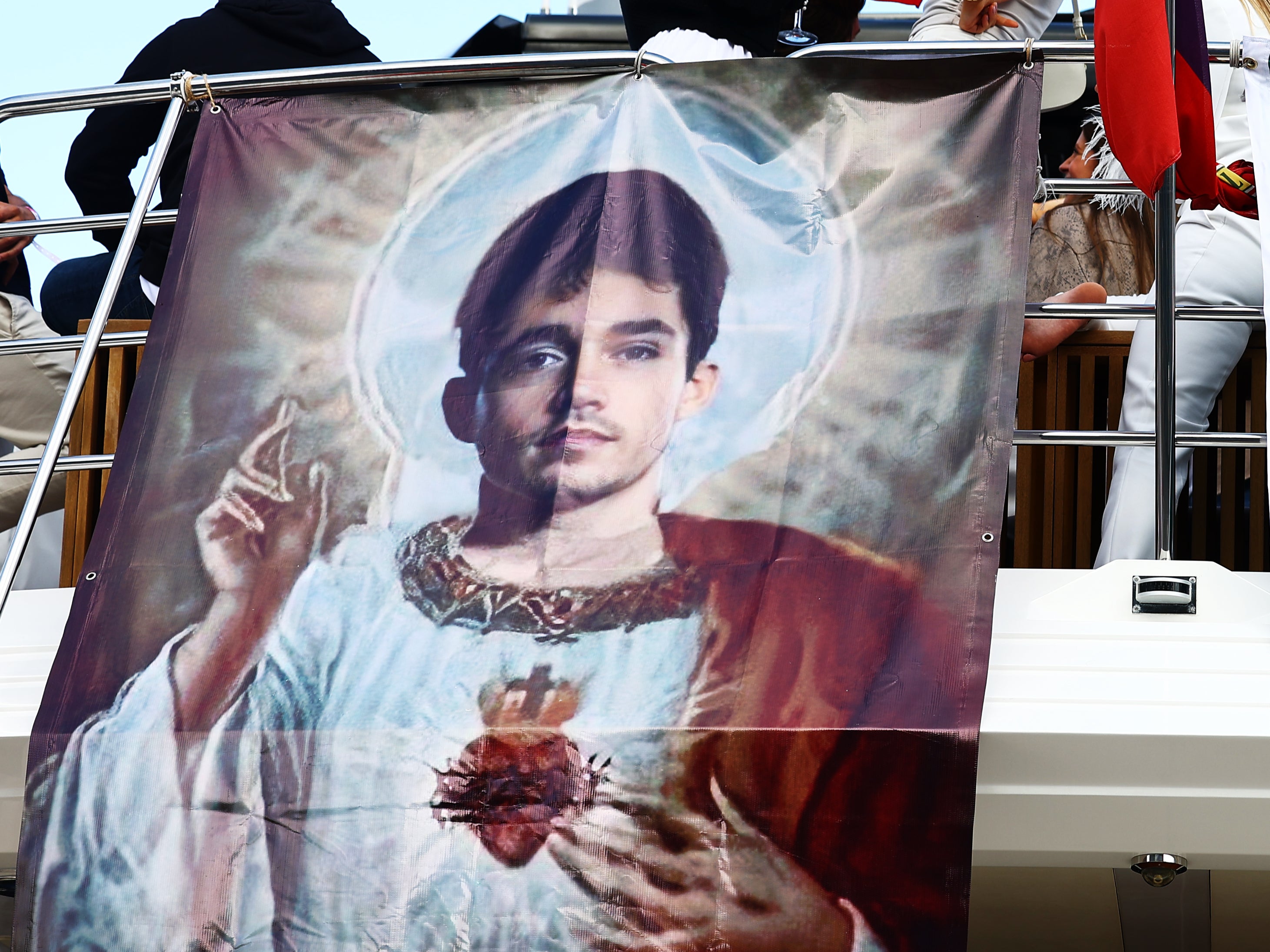 A flag of Charles Leclerc shows his fandom in Monaco
