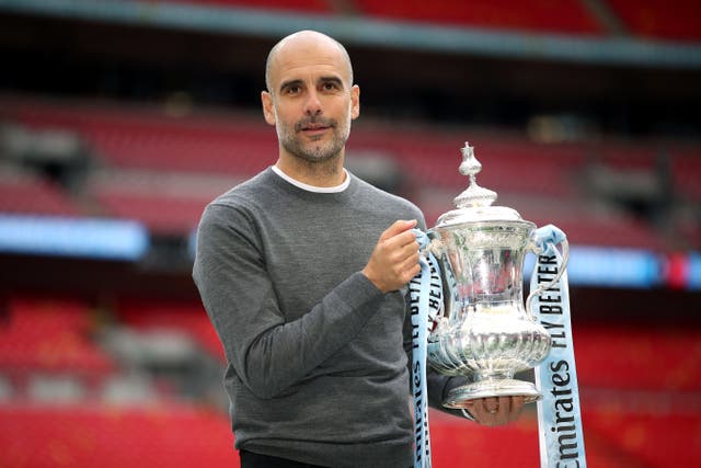 Pep Guardiola has his sights on the FA Cup again but is taking nothing for granted (Nick Potts/PA)
