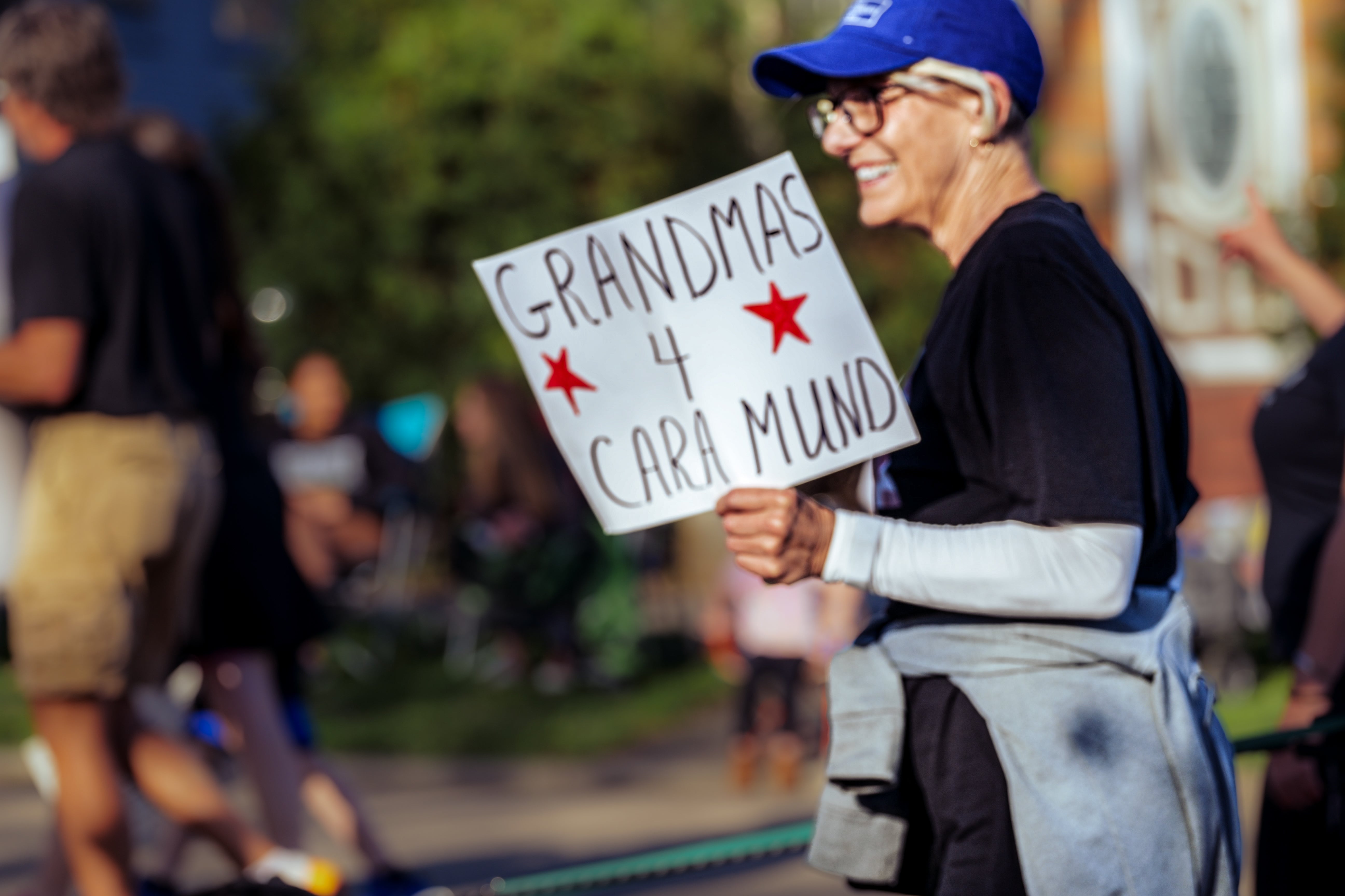 Mund says her voter base includes ‘fed-up Republican women;’ supporters turned out for her at annual high school band parade in the North Dakota capital earlier this month