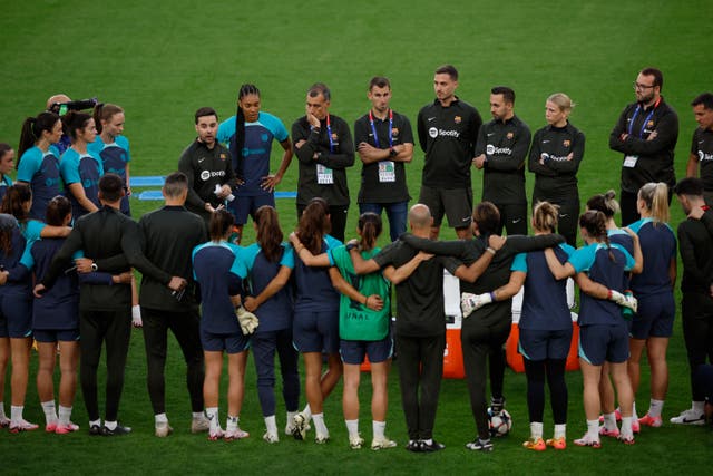 <p>Barcelona coach Jonatan Giraldez talks to his players before the Women’s Champions League final in Bilbao </p>