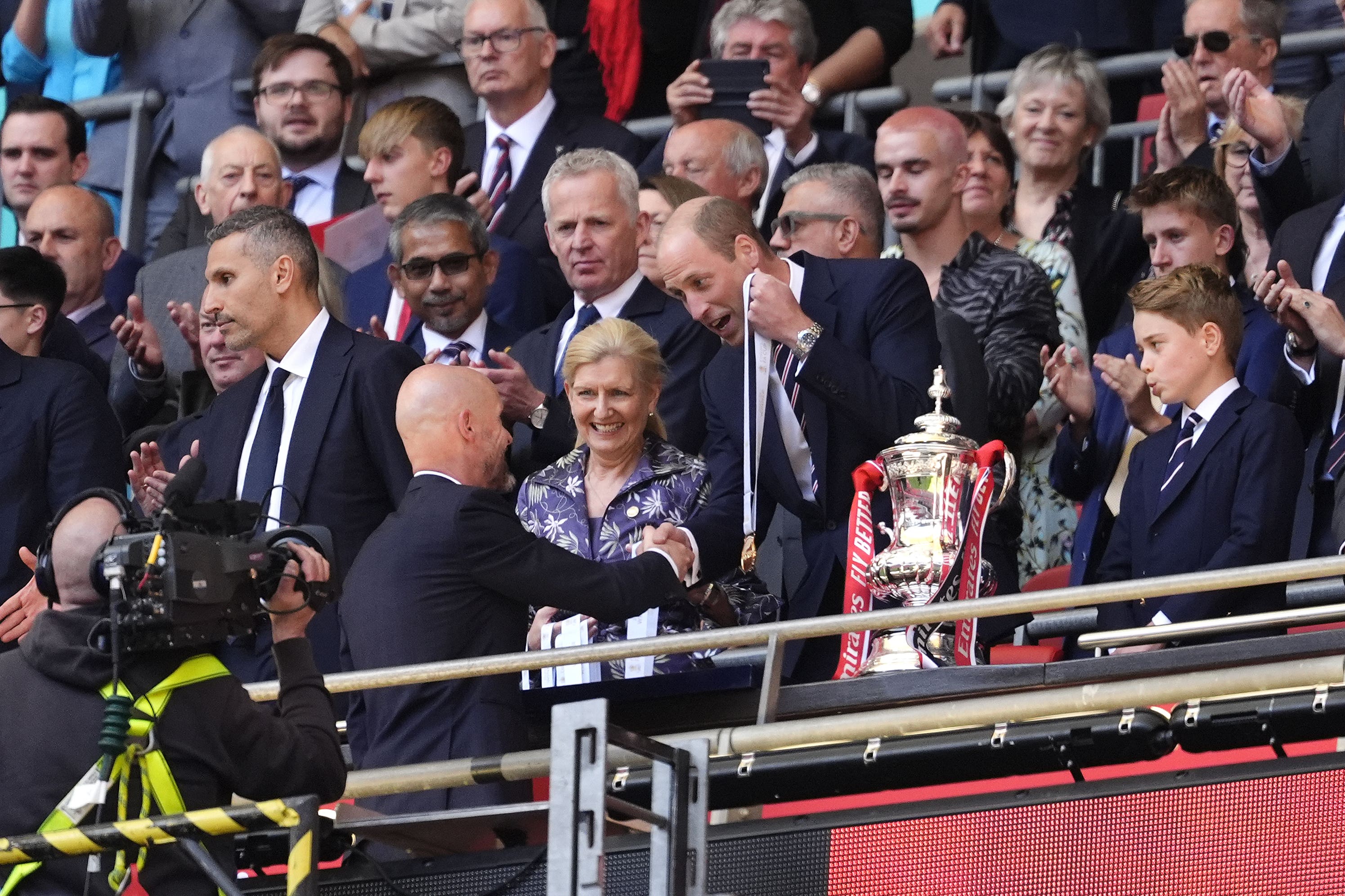 William and George shook hands with the players after the match (Nick Potts/PA)