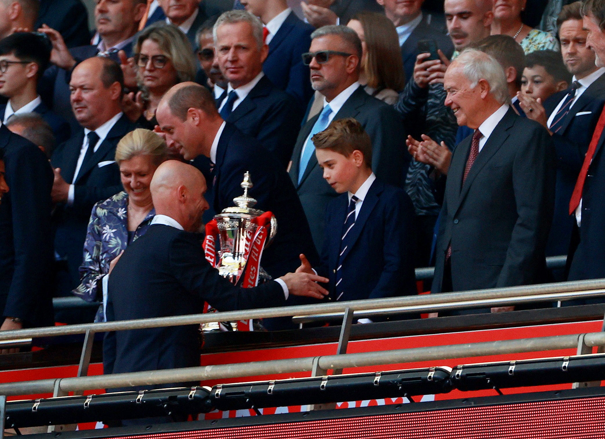 Erik ten Hag shakes hands with Prince George after winning the FA Cup
