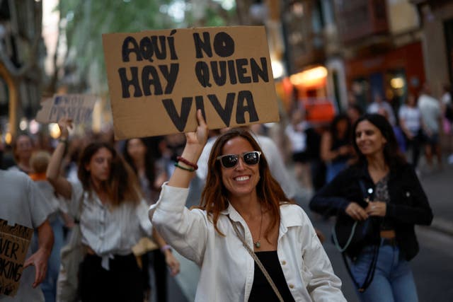 <p>In May, 10,000 demonstrators gathered in Palma to demand measures be taken against mass tourism on the island </p>