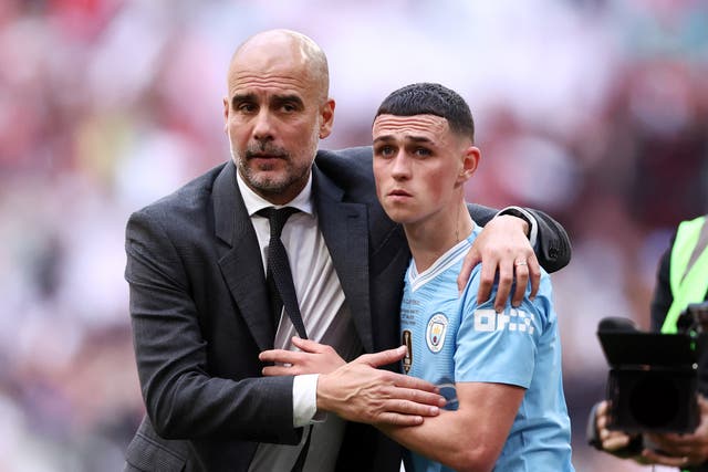 <p>Pep Guardiola and Phil Foden couldn’t stop Manchester City from falling to a Wembley defeat </p>