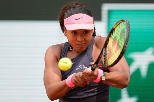 Naomi Osaka came through in three sets at Roland Garros (Christophe Ena/AP)