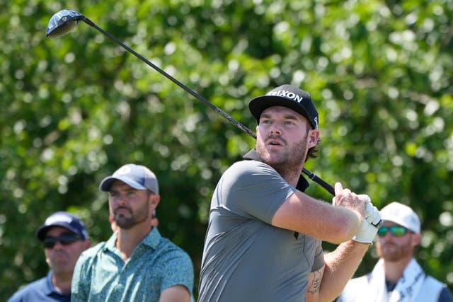 <p>Grayson Murray hits off the 18th tee during the first round of the PGA Zurich Classic golf tournament a</p>