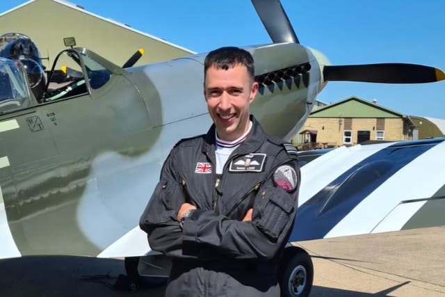 <p>Squadron leader Mark Long was killed in a Spitfire crash near RAF Coningsby in Lincolnshire during a Battle of Britain commemoration event on Saturday</p>