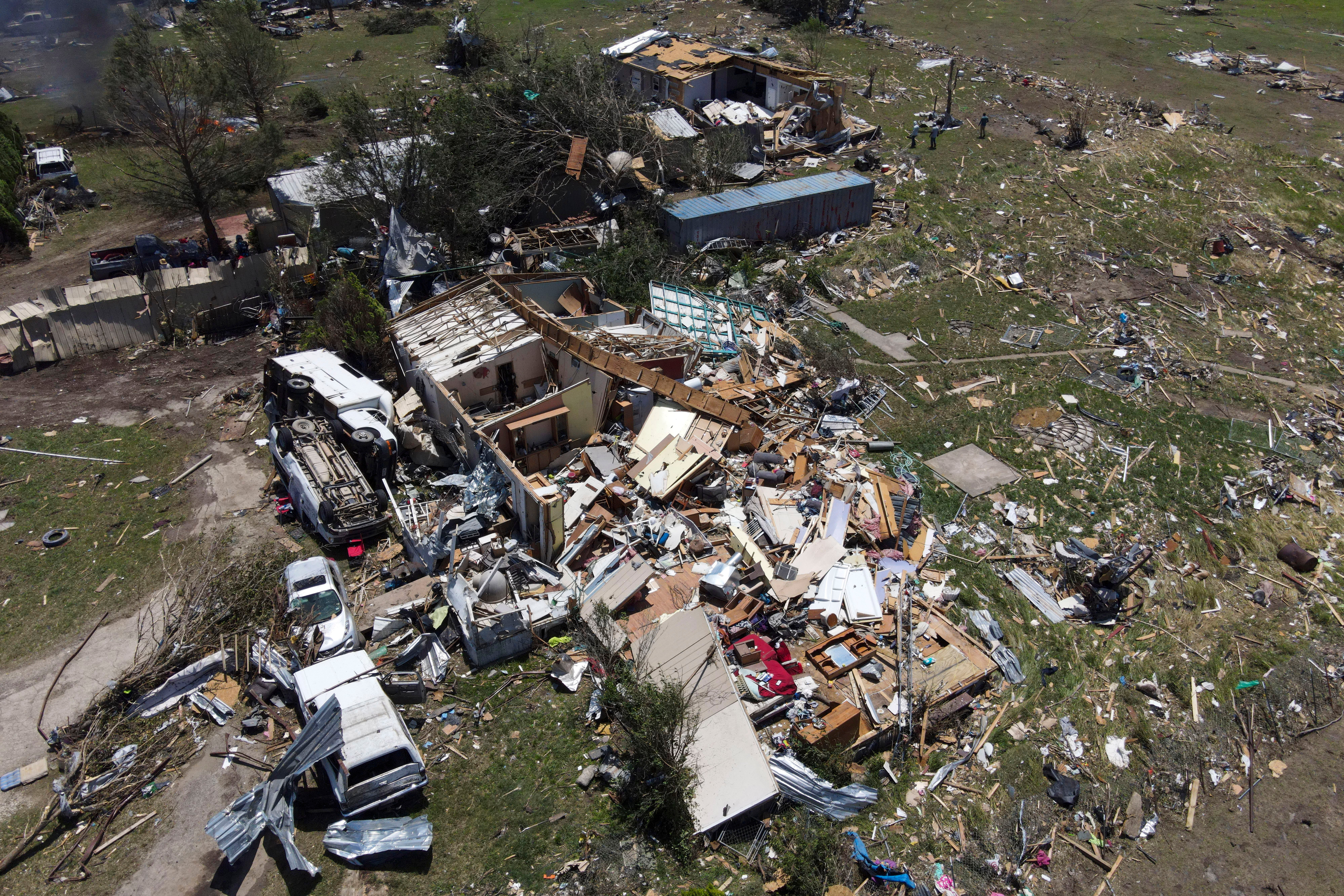 Destroyed homes are seen after a deadly tornado rolled through the previous night, Sunday, May 26, 2024, in Valley View, Texas.