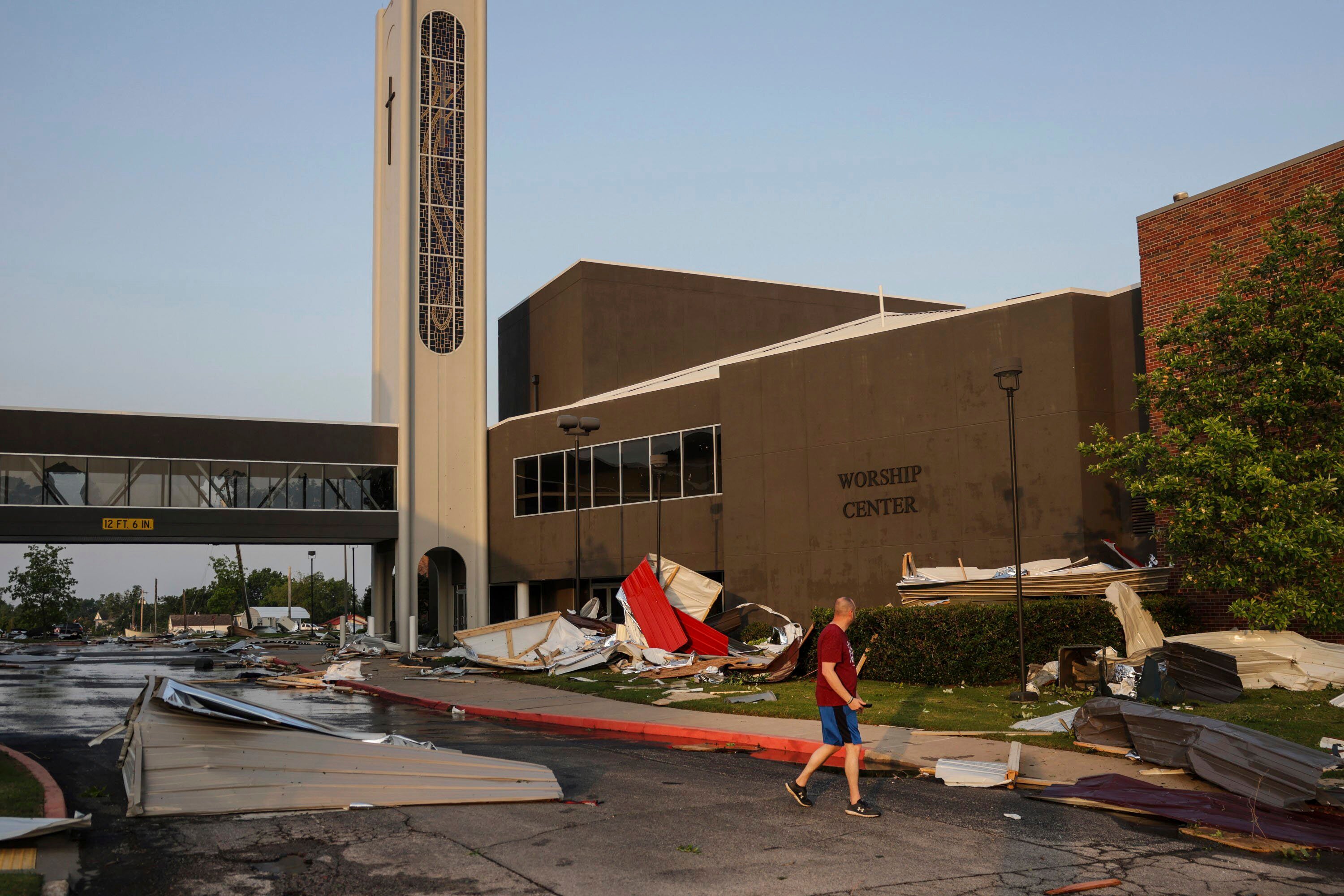 A man views damage at First Baptist Church near downtown Claremore, Oklahoma