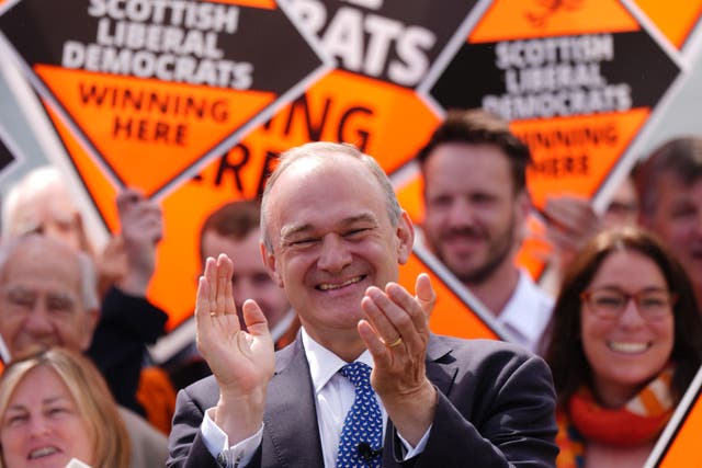 Liberal Democrat leader Sir Ed Davey with activists during their party’s Scottish launch at North Queensferry (Andrew Milligan/PA)