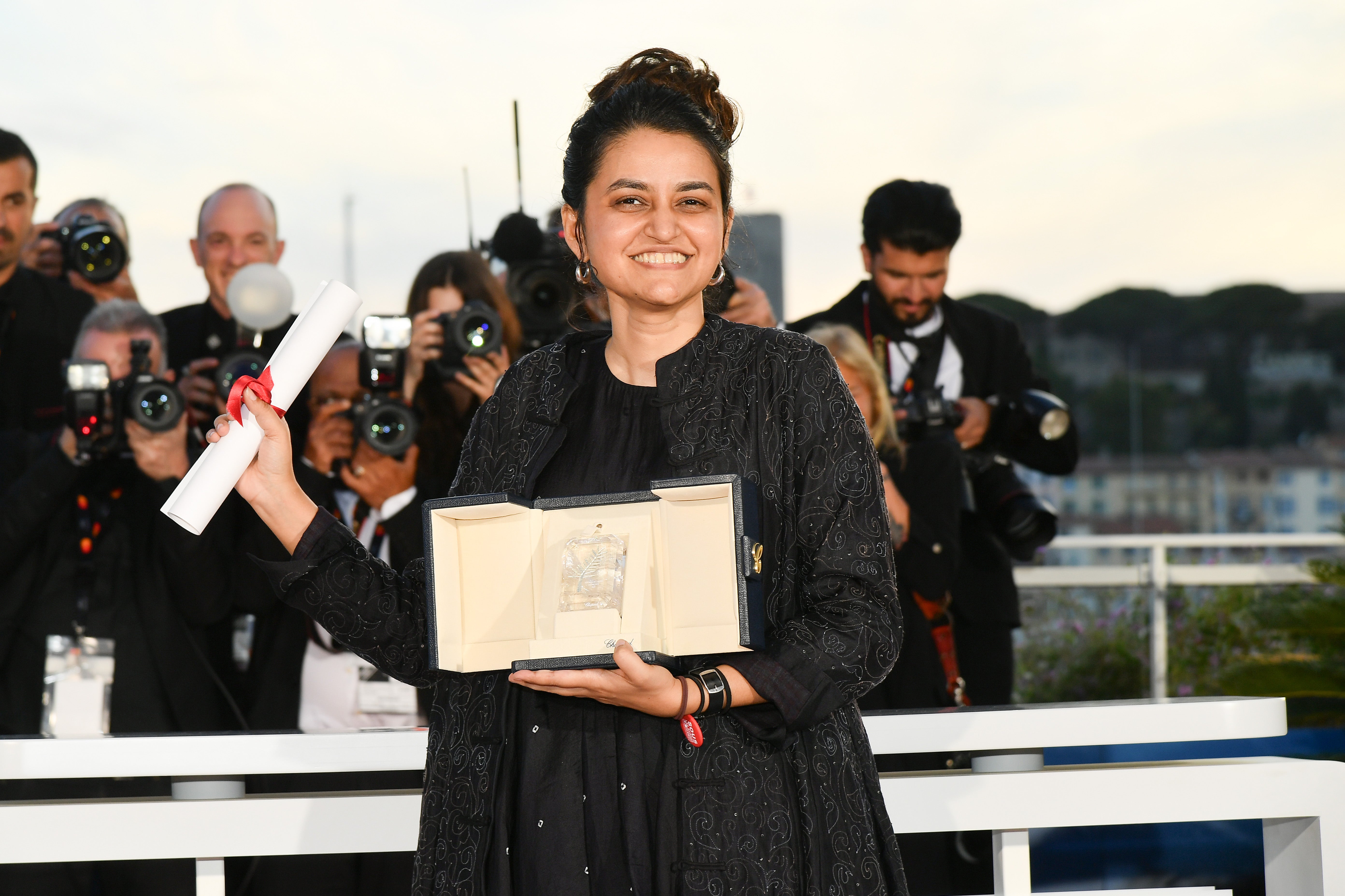 Payal Kapadia poses with the 'Grand Prix' Award for 'All We Imagine As Light' during the Palme D'Or Winners Photocall