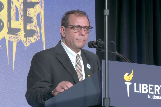 <p>Libertarian presidential candidate Dr Michael Rectenwald on stage at the party convention in Washington DC on 25 May 2024</p>