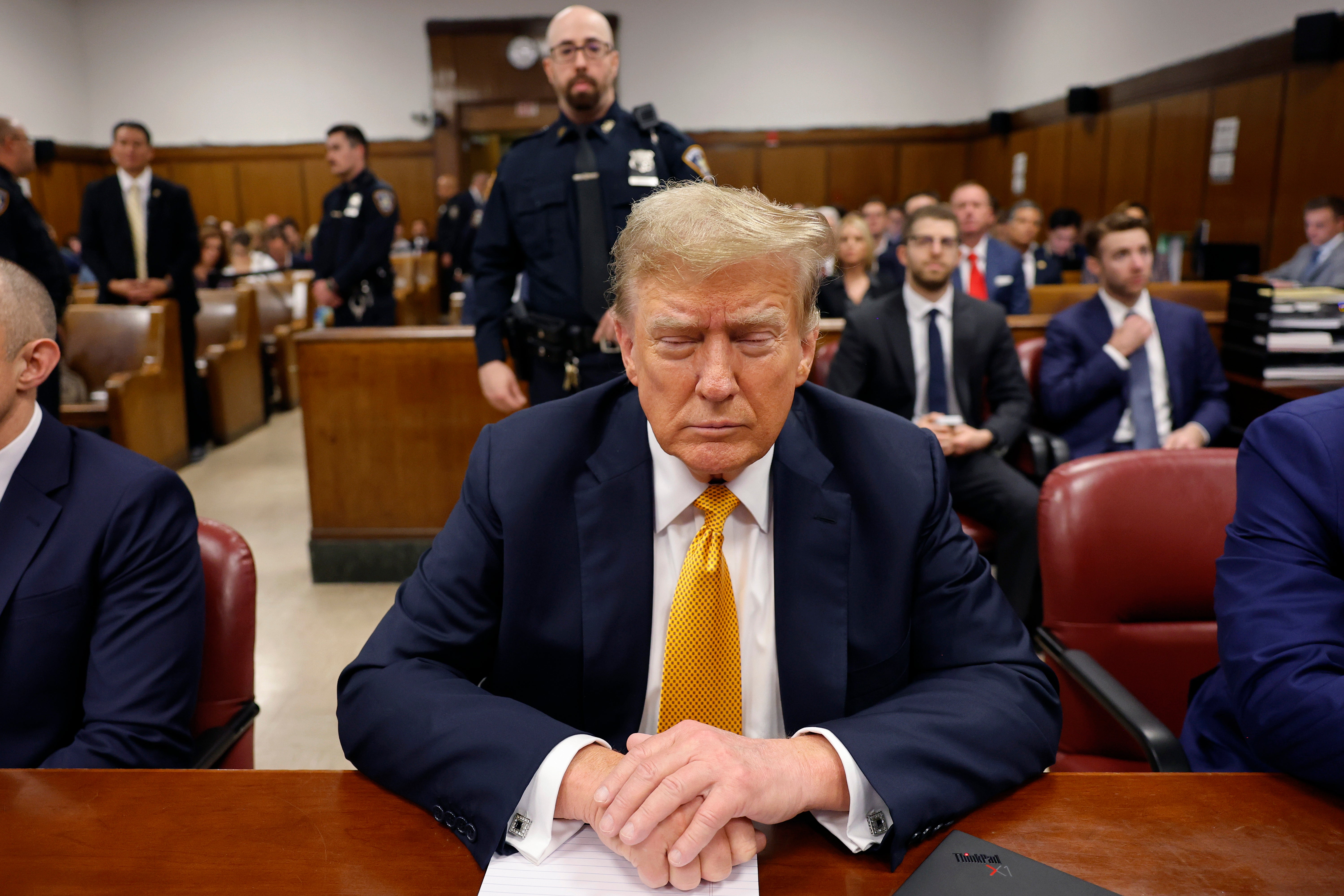 Donald Trump sits at the defense table inside a Manhattan courtroom for his hush money trial on May 21