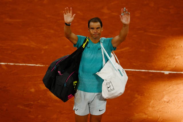 <p>Au revoir: Rafael Nadal waves to the Roland Garros crowd as he walks off after his first-round defeat by Alexander Zverev</p>