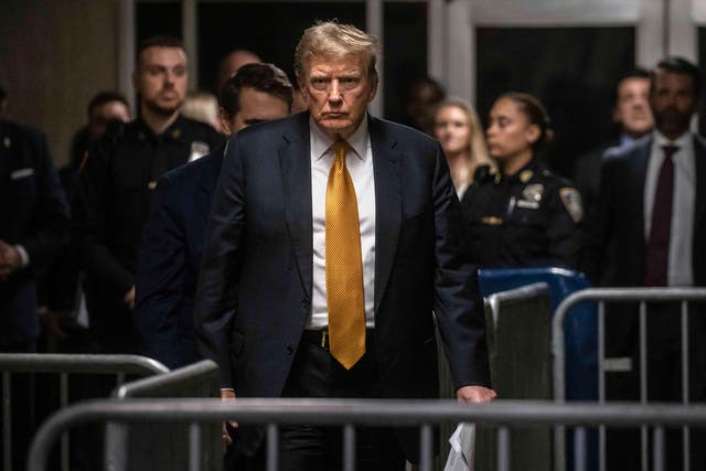 <p>Former president Donald Trump at Manhattan Criminal Court on Tuesday 21 May 2024 </p>