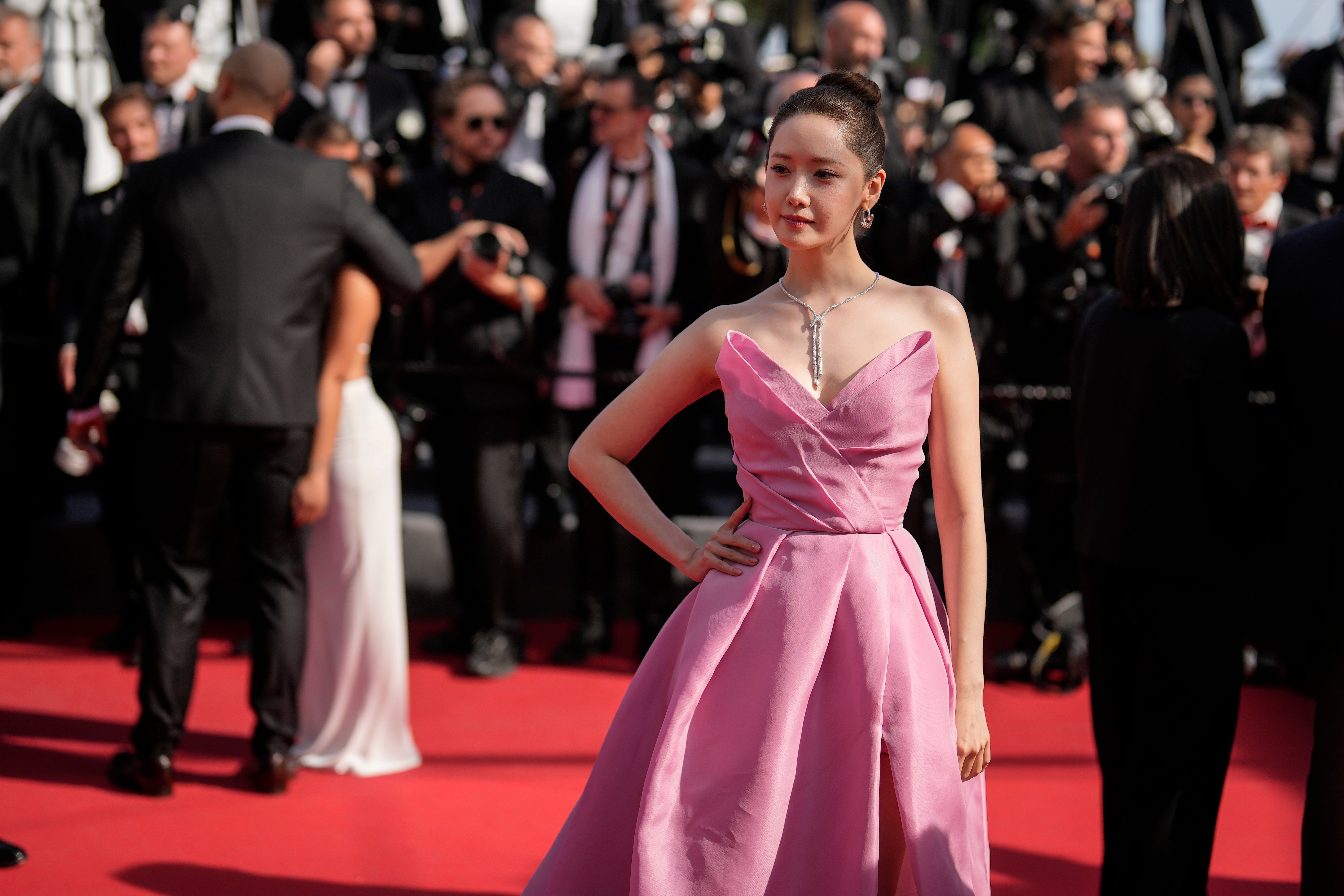 An unidentified female security has been criticized for her treatment of Korean actor Im Yoon-ah (pictured) on the red carpet at Cannes