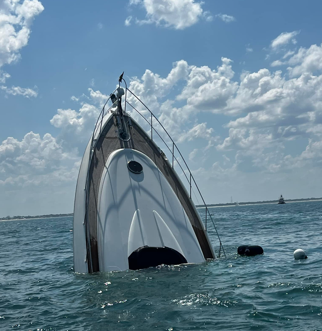 <p>The Atlantis, pictured sinking on Saturday off the coast of Florida, had two passengers on board who were safely rescued by the St John’s County Fire Department</p>