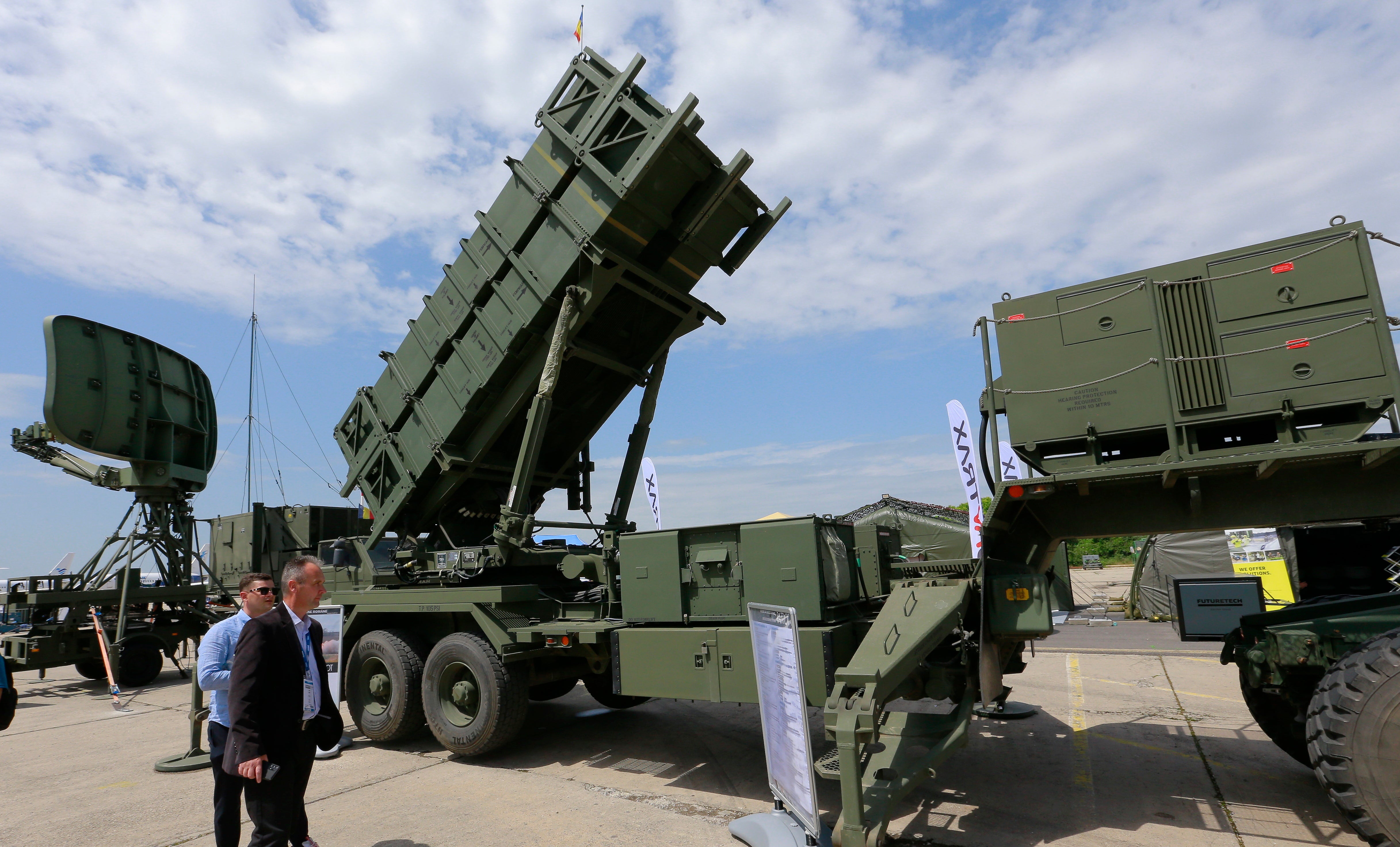 Visitors check US-made Patriot surface-to-air missile system during the first day of the Black Sea Defense & Aerospace Exhibition 2024 (BSDA'24) in Bucharest, Romania