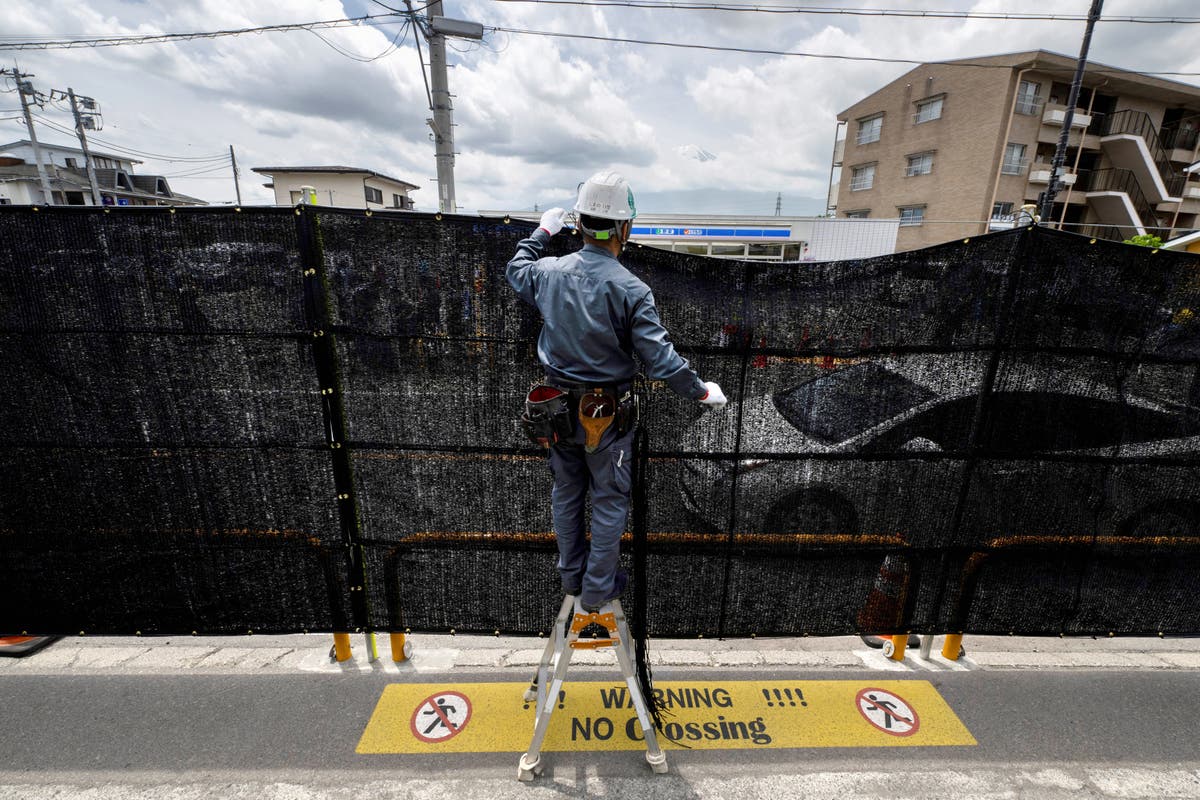 Tourists in Japan poke holes in barrier blocking Mount Fuji view: ‘It’s a shame’