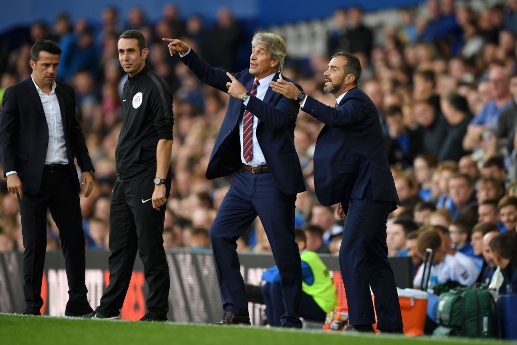 Maresca, right, with Manuel Pellegrini at West Ham