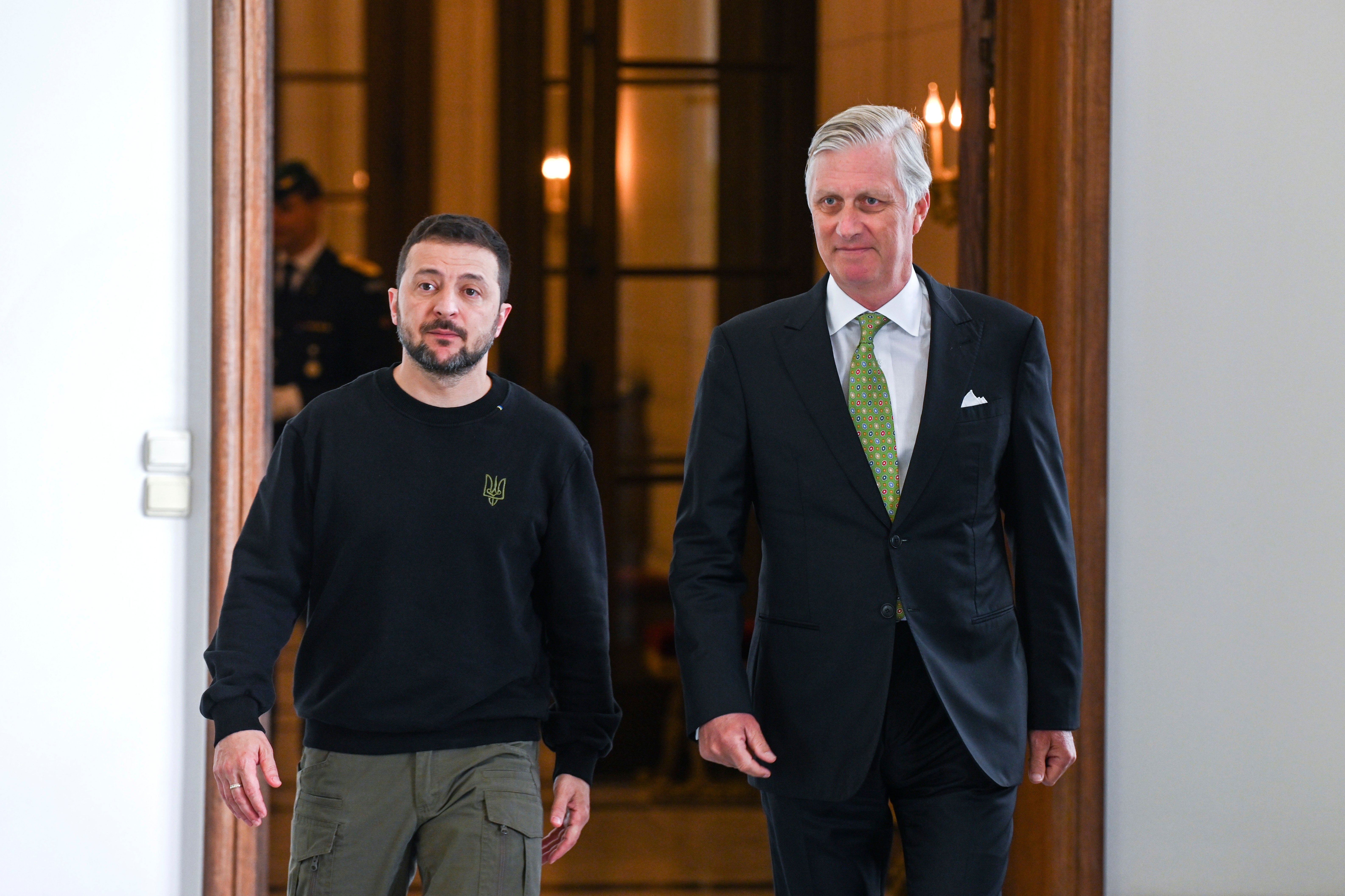 Belgium's King Philippe, right, walks with Ukraine's President Volodymyr Zelensky prior to a meeting at the Royal Palace in Brussels
