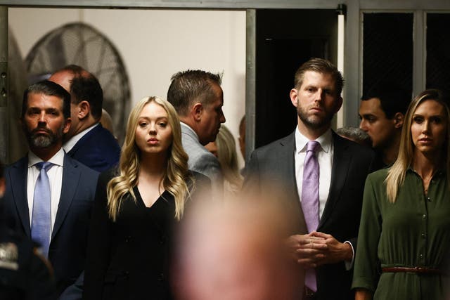 <p>Donald Trump Jr., Tiffany Trump, Eric Trump, and Lara Trump listen to Donald Trump speak to the media on 28 May at Manhattan Criminal Court</p>