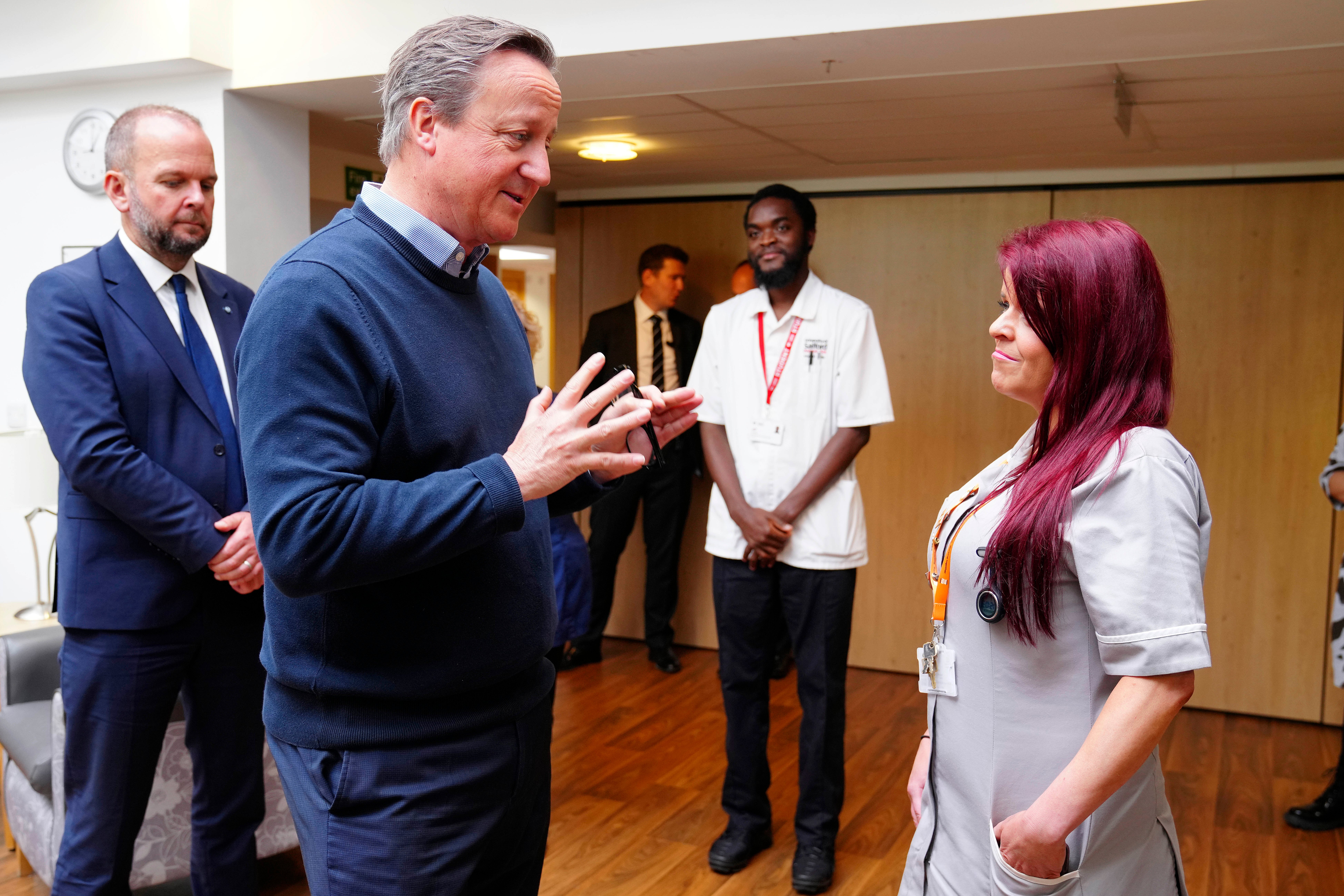 Foreign Secretary David Cameron meets visitors at The Fed, Caring for Community, during a Conservative general election campaign event in Manchester