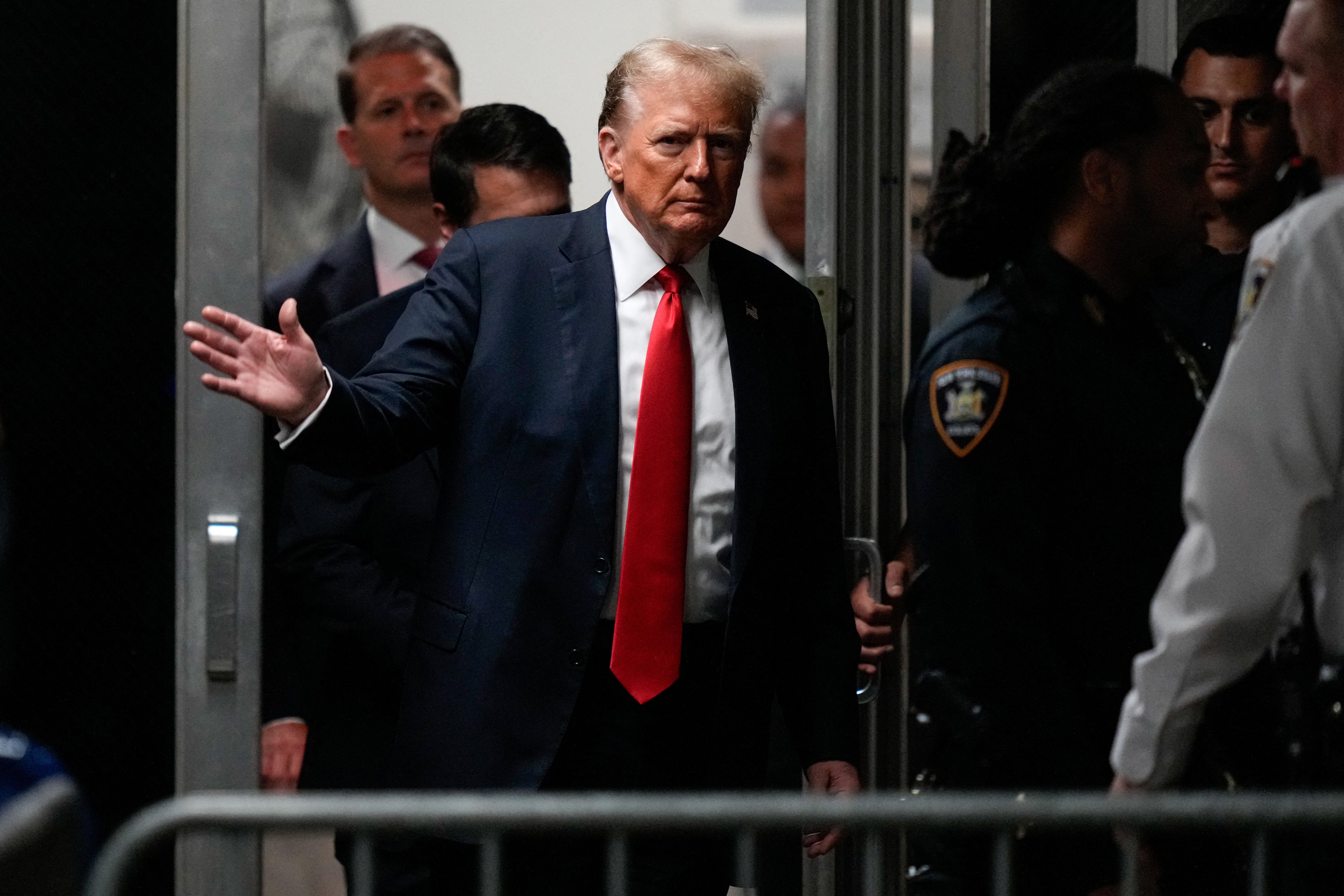 Donald Trump leaves a courtroom in Manhattan during closing arguments in his hush money trial on May 28.