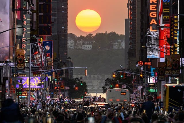 <p>Manhattanhenge is when the sunset and New York City’s streets perfectly align </p>