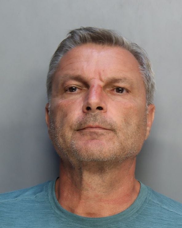 Robert Marcu, 60, has been arrested on felony charges of aggravated child abuse and battery by strangulation after he choked a 10-year-old boy who had been playing with his son