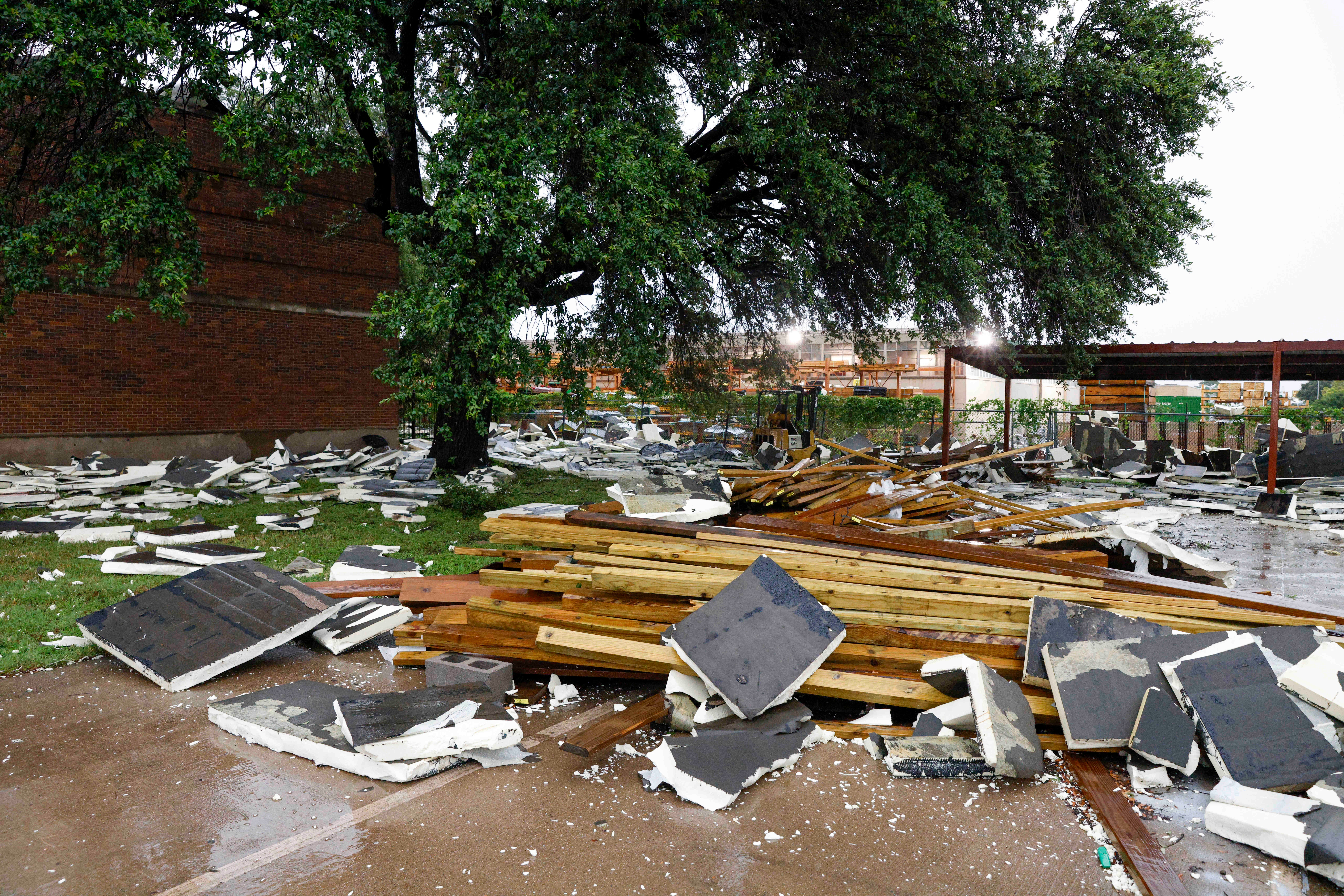 A Rainbow Hardware store is pictured in Dallas, Texas, after destructive thunderstorms ripped through the region, leaving more than a million people without power across the state.