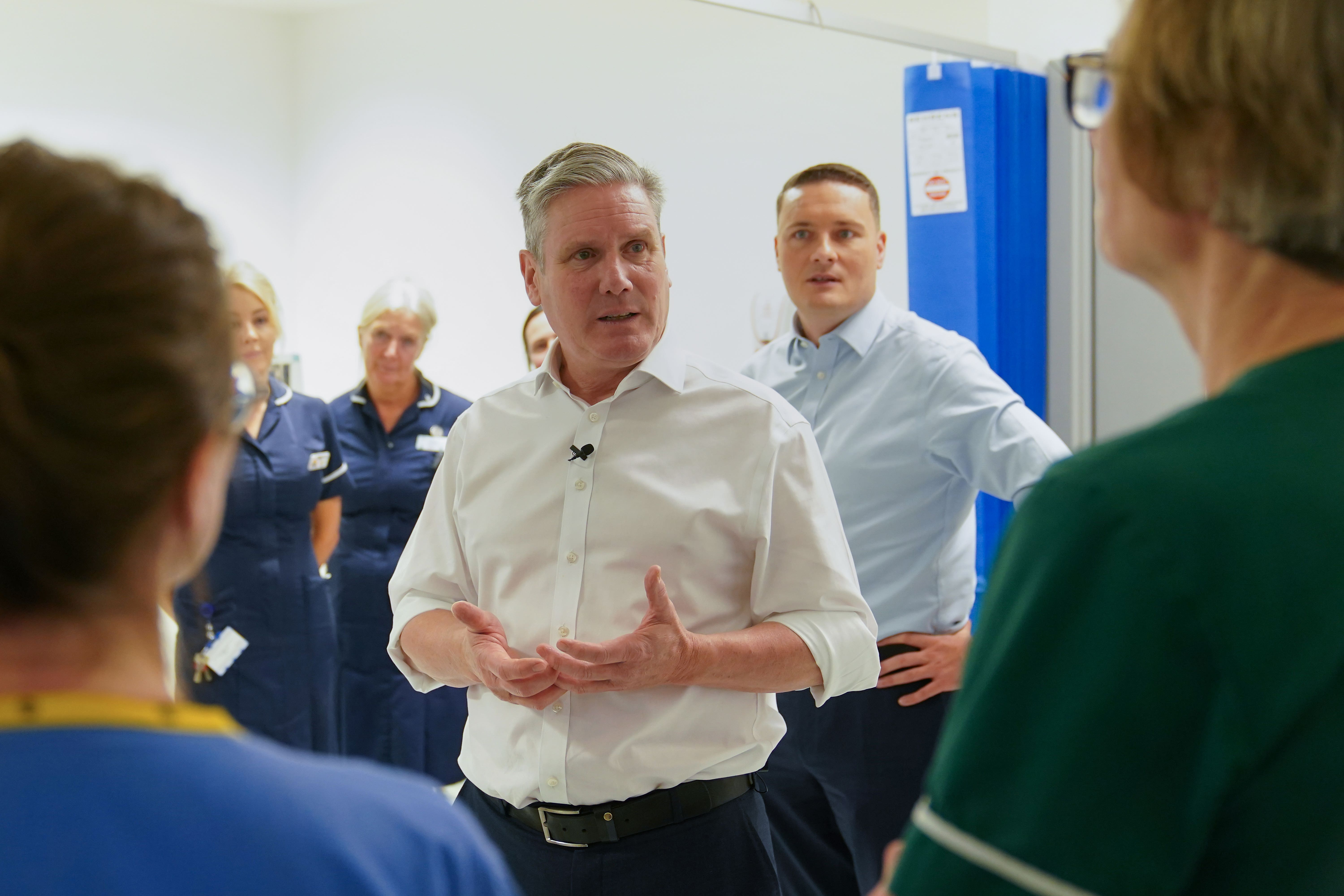 Labour leader Sir Keir Starmer and shadow health secretary Wes Streeting meet staff during a visit to the theatre recovery ward in the Bexley Wing of St James’ University Hospital in Leeds