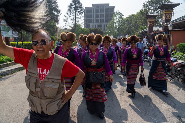 <p>People from the mountaineering community in a rally to mark the anniversary of the first ascent of Everest </p>