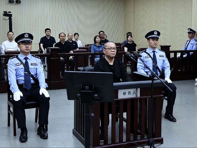 <p>Bai Tianhui during his sentencing at a court in Tianjin on 28 May</p>