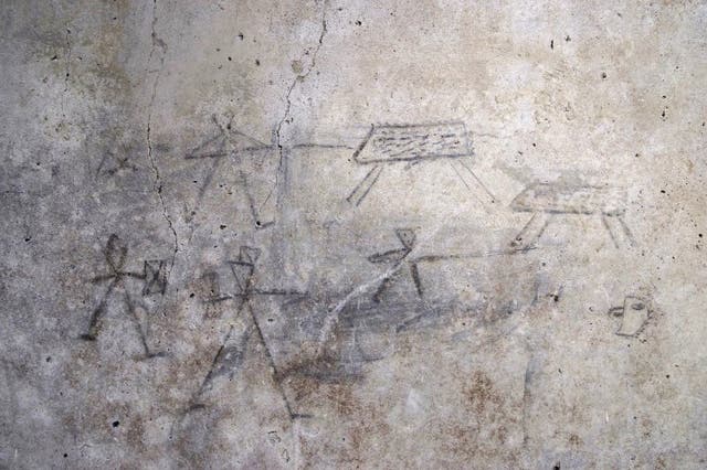 <p>Cave drawings in Pompeii depict gladiators Courtesy of Pompeii Archaeological Park
</p>