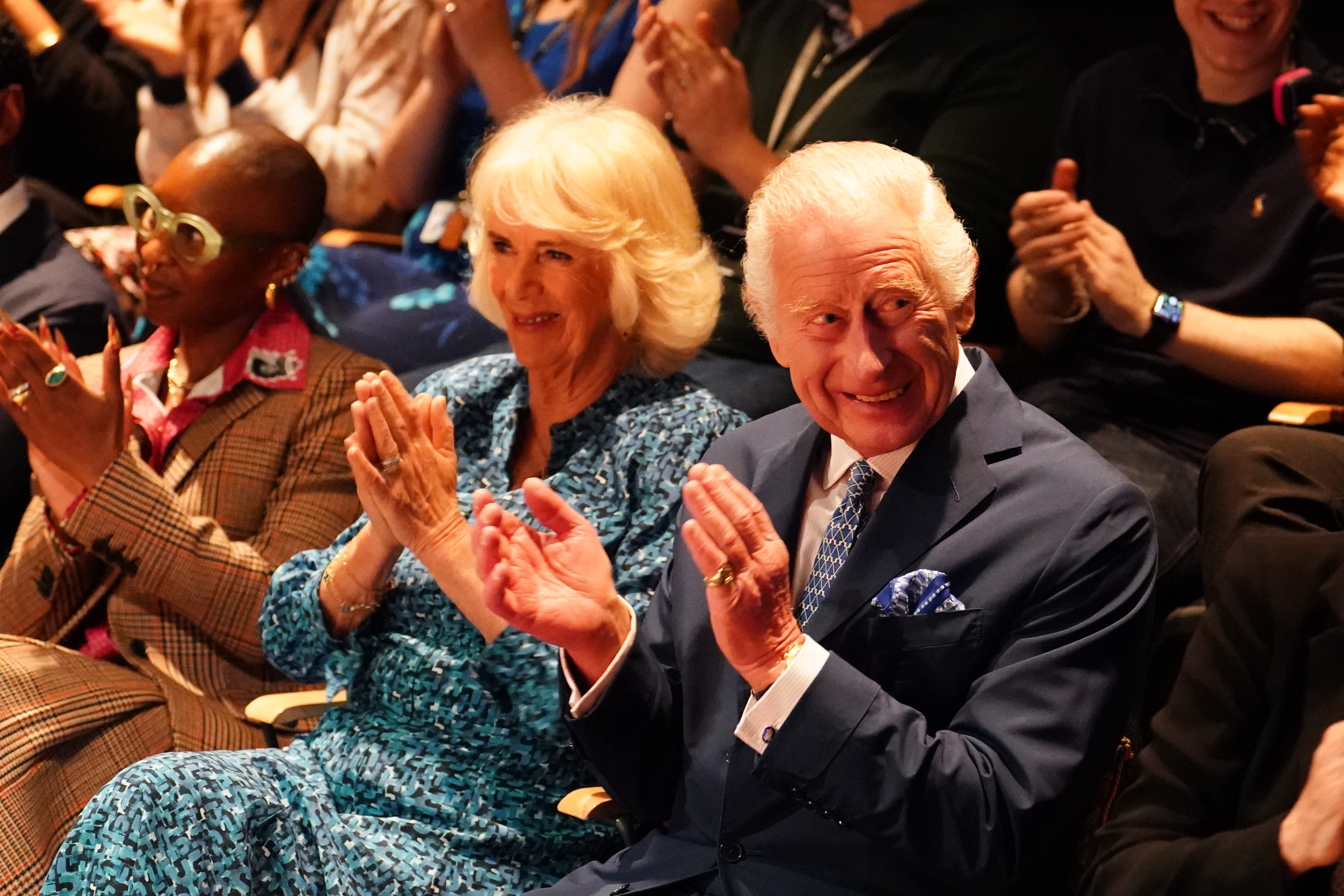 The King and Queen watch an extract of a play performed by third year acting students in the Gielgud Theatre during a visit to Rada in London, to celebrate the school’s 120th anniversary (Jordan Pettitt/PA)