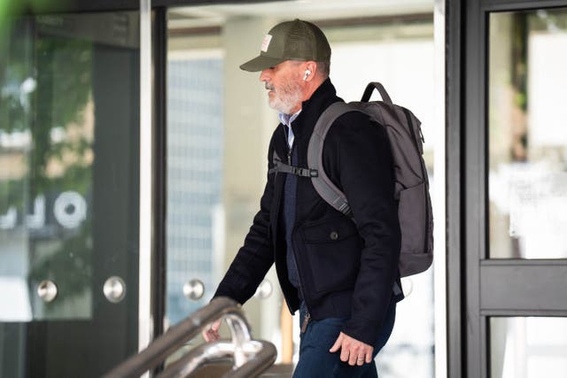 Football pundit Roy Keane told a court he was left ‘in shock’ after being allegedly ‘headbutted’ through doors during a Premier League match (James Manning/PA)